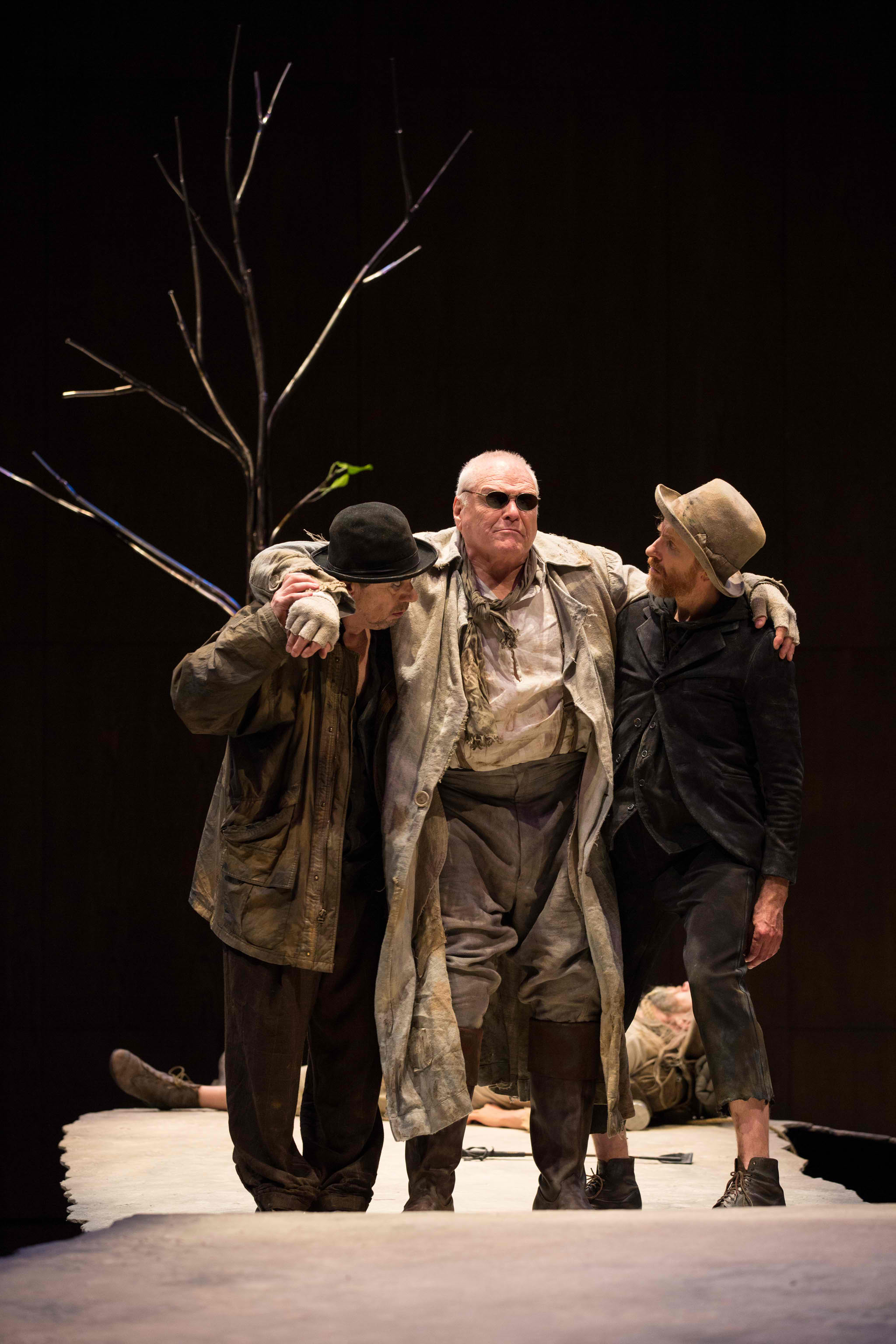 From L to R, Stephen Ouimette, Brian Dennehy and Tom Rooney (Randy Hughson lying on the ground behind) in Waiting For Godot at the Stratford Festival