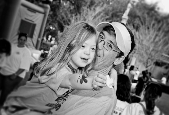 Down child and father