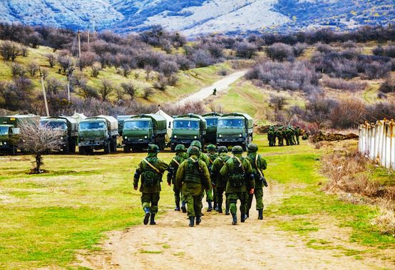 Crimea Russian troops walking background