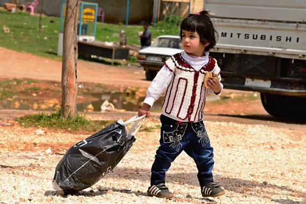syria refugee girl bag