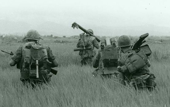 Marines_Move_Through_Flooded_Rice_Paddies,_1967_(16402186656)