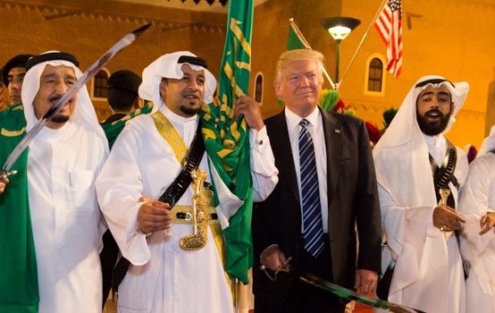 President Donald Trump poses for photos with ceremonial swordsmen on his arrival to Murabba Palace, as the guest of King Salman bin Abdulaziz Al Saud of Saudi Arabia, Saturday evening, May 20, 2017, in Riyadh, Saudi Arabia. (Official White House Photo by Shealah Craighead)