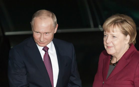 Putin Merkel