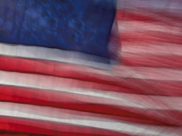 USA American flag against Sky with Motion Blur