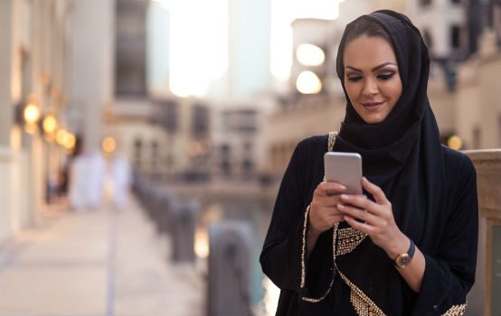 Muslim woman phone