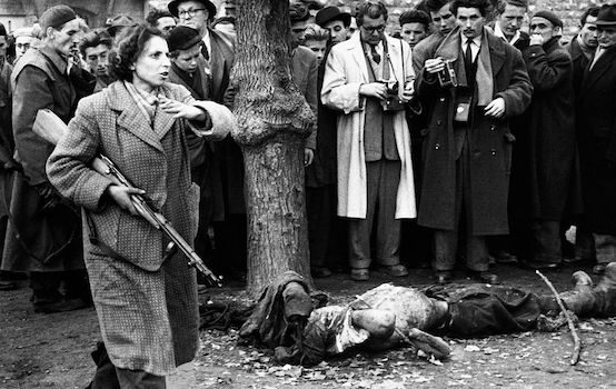 Hungarian Resistance Fighter Carrying Gun Beside a Wounded Countryman