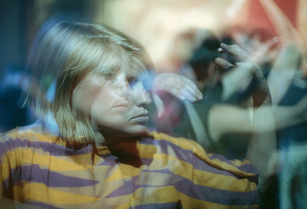 Blurred Image of Hippie Girl Dancing