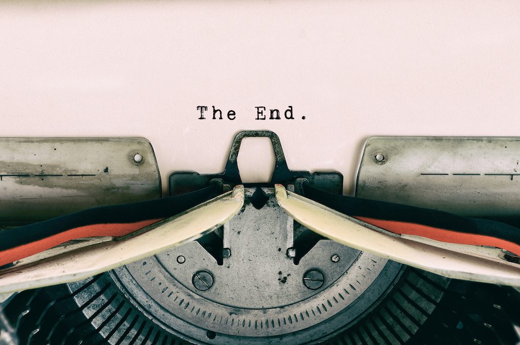 The End words type on Vintage Typewriter