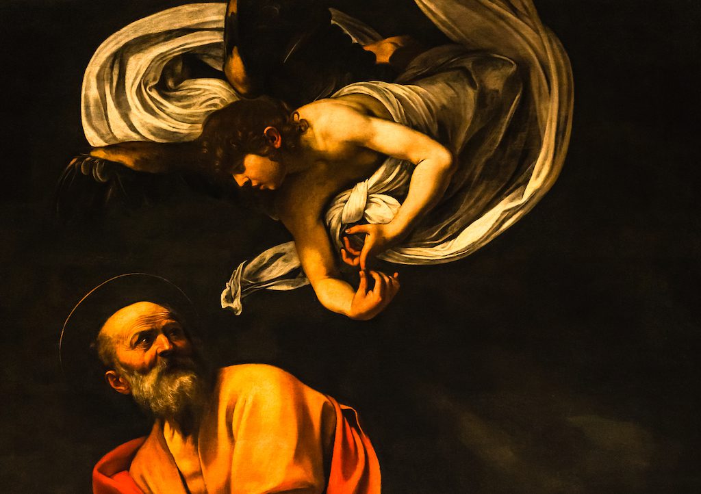 nspiration of Saint Matthew panting by by Michelangelo Merisi da Caravaggio inside Church of St. Louis of the French, Rome, Italy