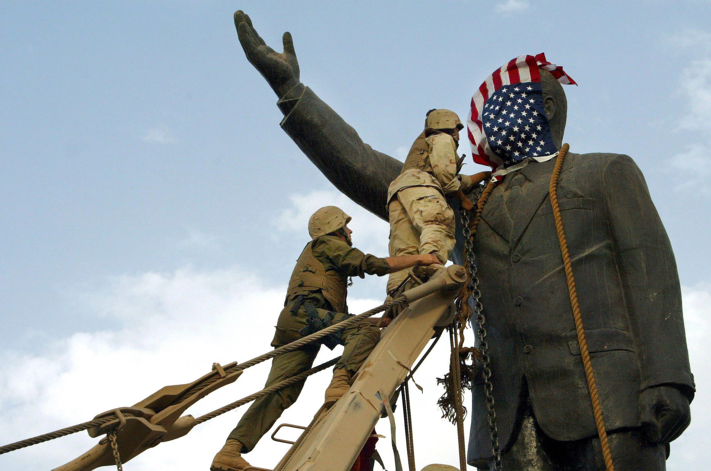 Operation Iraqi Freedom - Day 21: Us Troops Enter Central Baghdad And Topple Statue Of Saddam Hussein On April 9, 2003 In Baghdad, Iraq