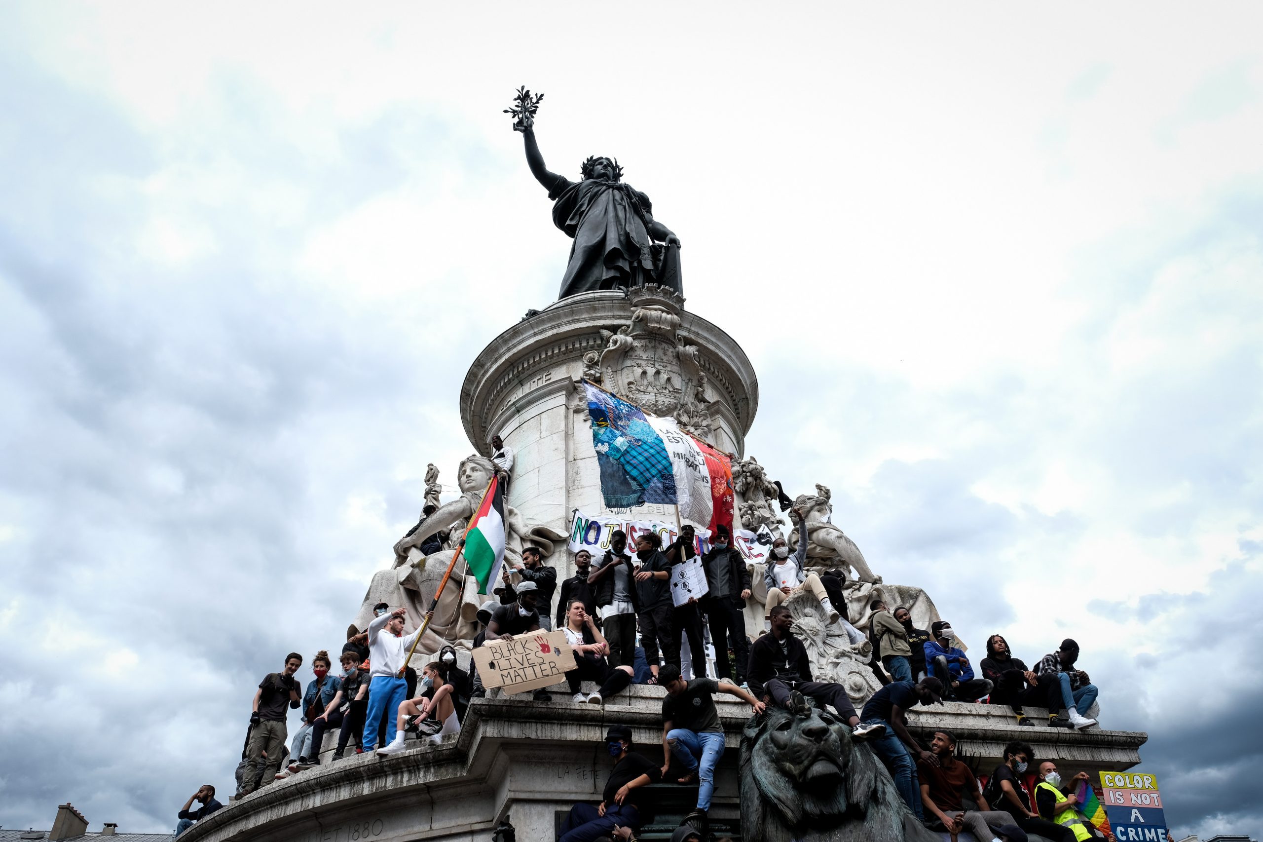 Protesters seen shouting slogans during the demonstration.