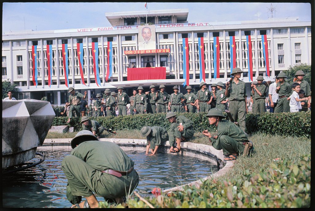 Victorious North Vietnamese Soldiers Wash in Palace Fountain