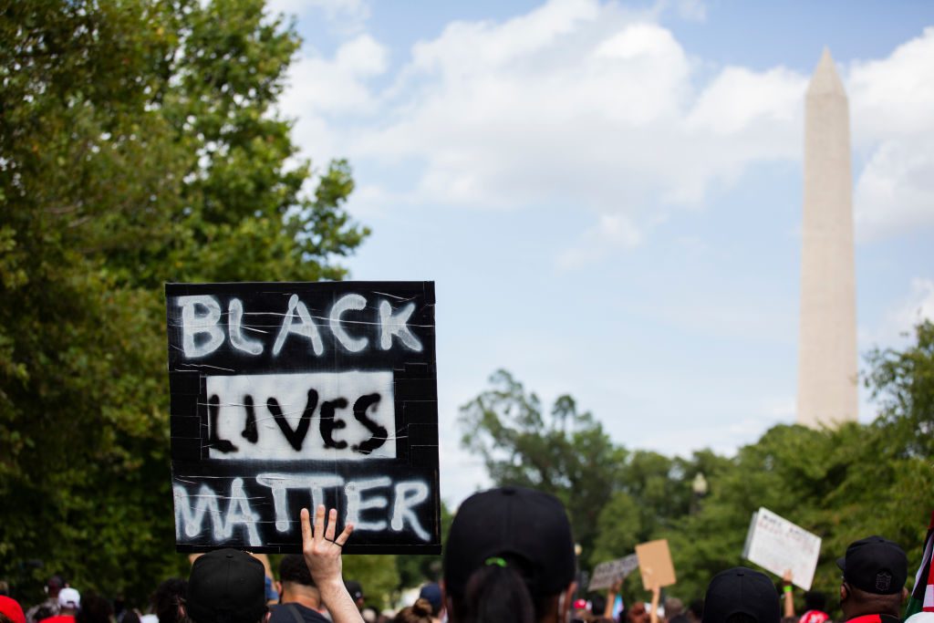 Tens Of Thousands Join ''Get Your Knee Off Our Necks'' March In Washington DC