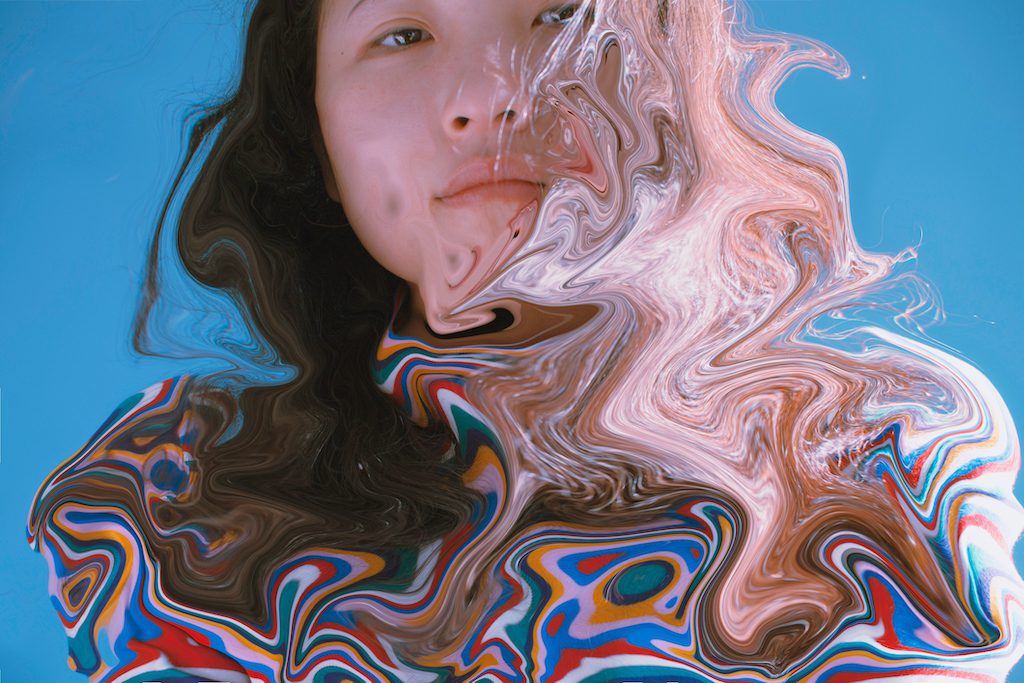 Digital Composite Image Of Woman With Dissolve In Water