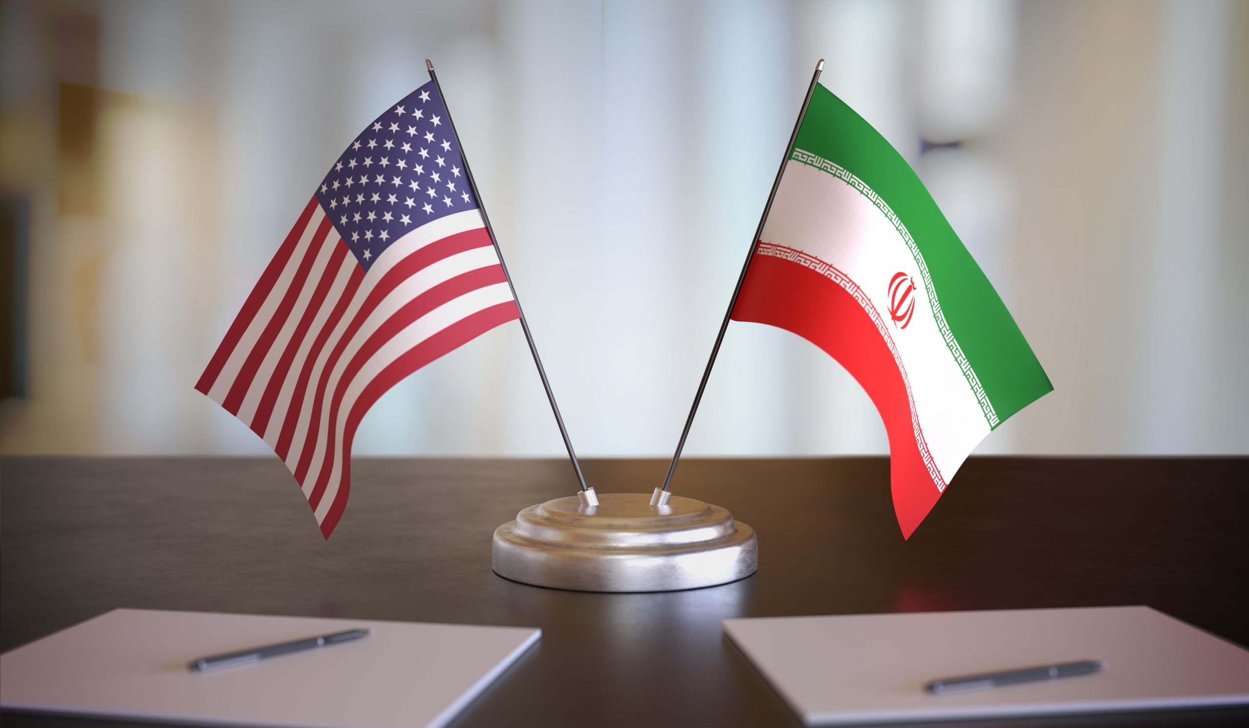 Usa,And,Iran,Flags,On,Table.,Negotiation,Between,Iran,And