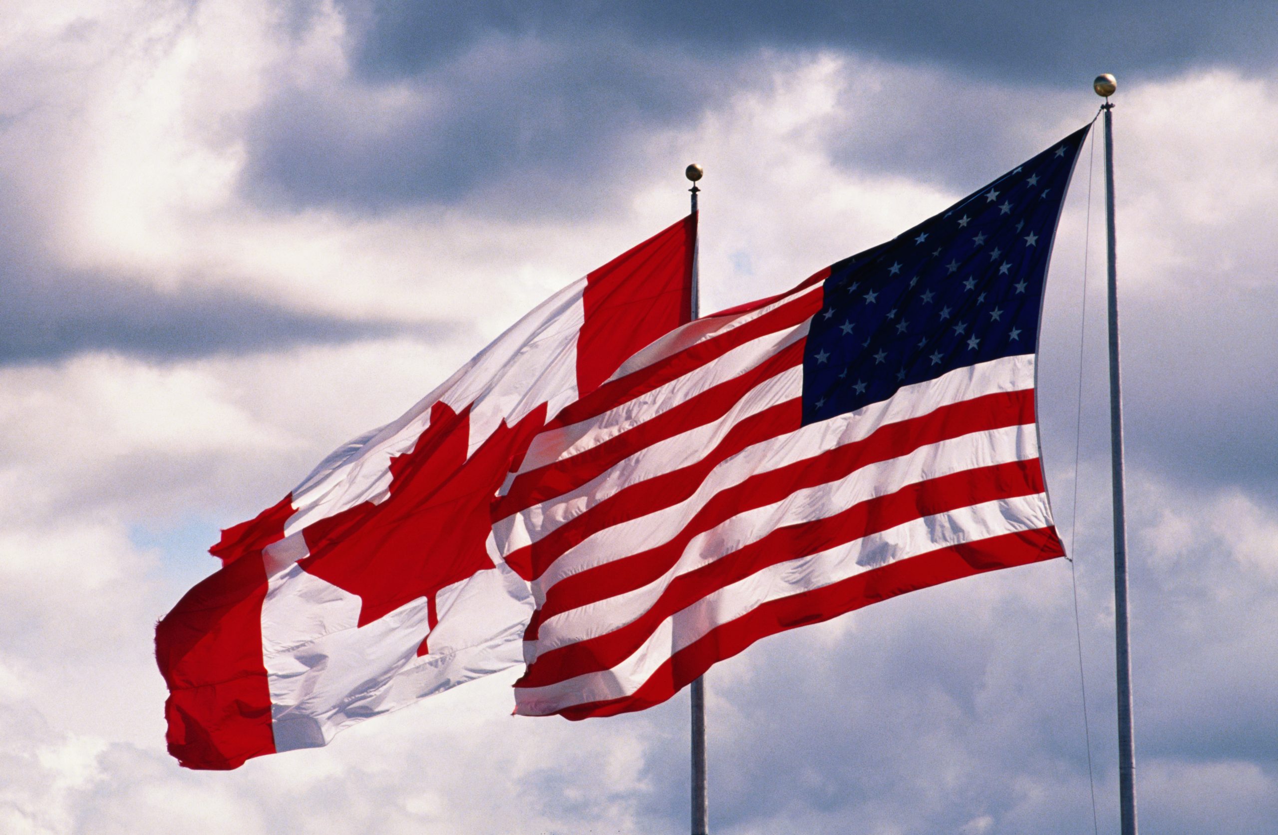 Flags at Peace Arch. US - Canadian border between Vancouver and Blaine.