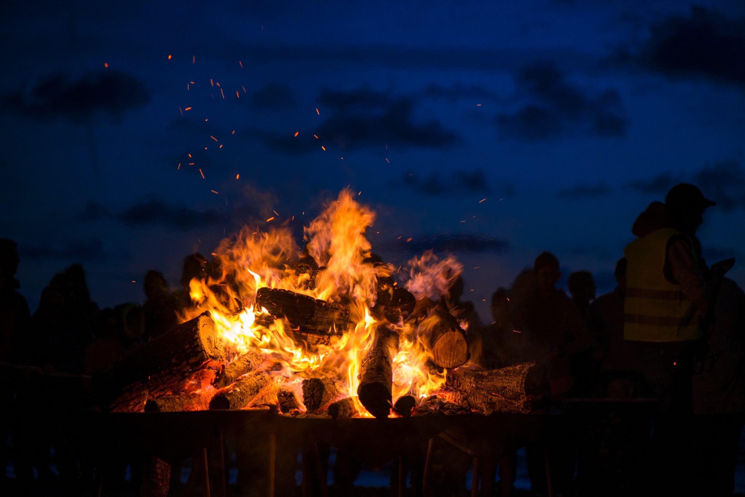 Large,Burning,Bonfire,With,Soft,Glowing,Flame,And,Sparkles,Flying