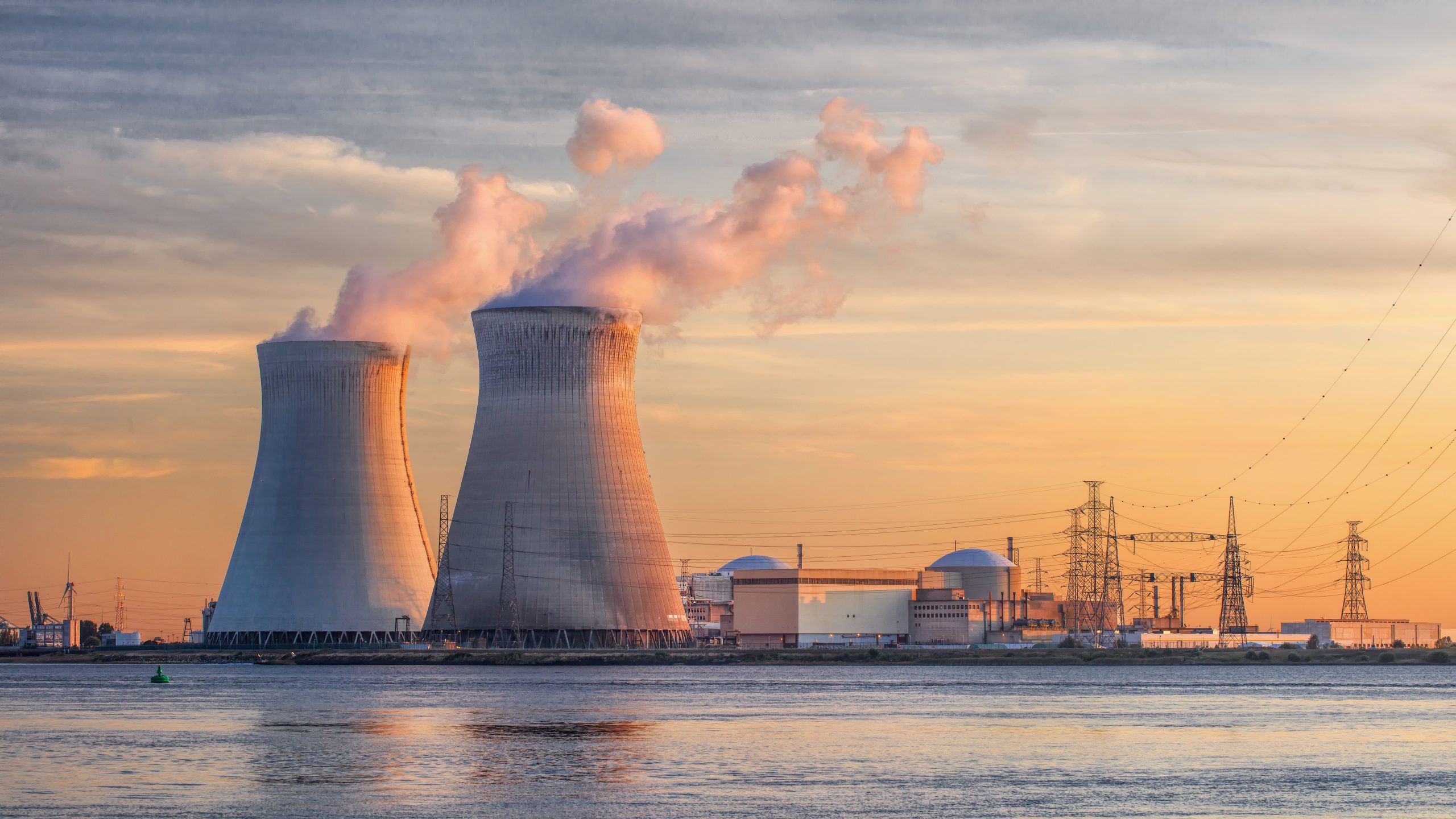 Late,Afternoon,Scene,With,View,On,Riverbank,With,Nuclear,Reactor