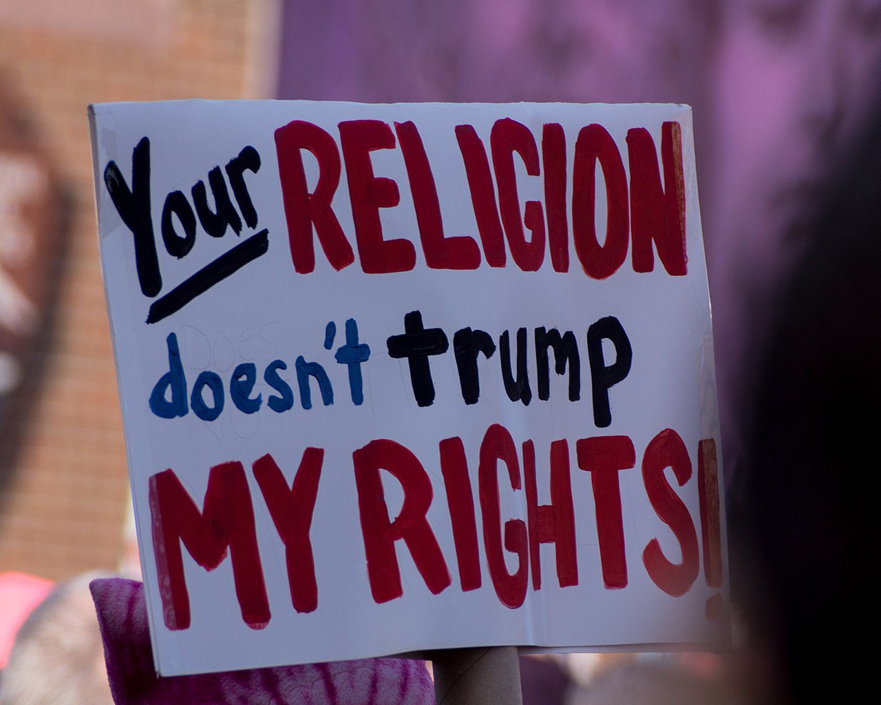 1280px-Your_religion_doesn't_trump_my_rights!_-WomensMarch_-WomensMarch2018_-SenecaFalls_-NY_(24937359687)