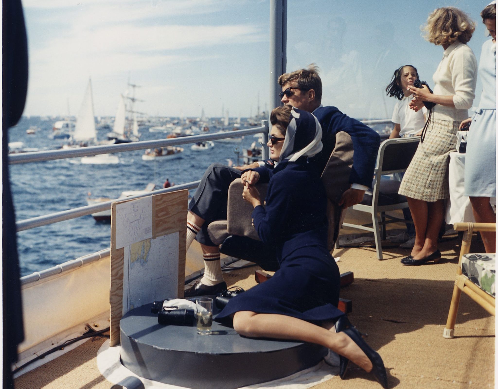 Watching_the_America's_Cup_Race._Mrs._Kennedy,_President_Kennedy,_others._Off_Newport,_RI,_aboard_the_USS_Joseph_P...._-_NARA_-_194214