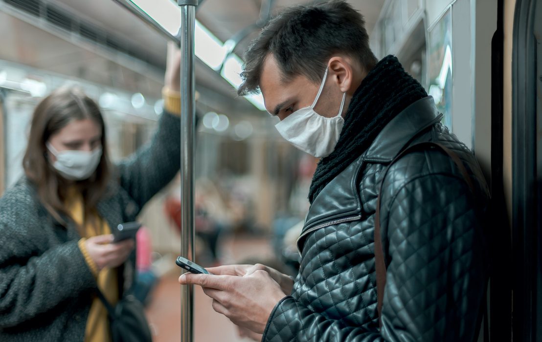 Passengers,In,Protective,Masks,Standing,In,The,Subway,Car.