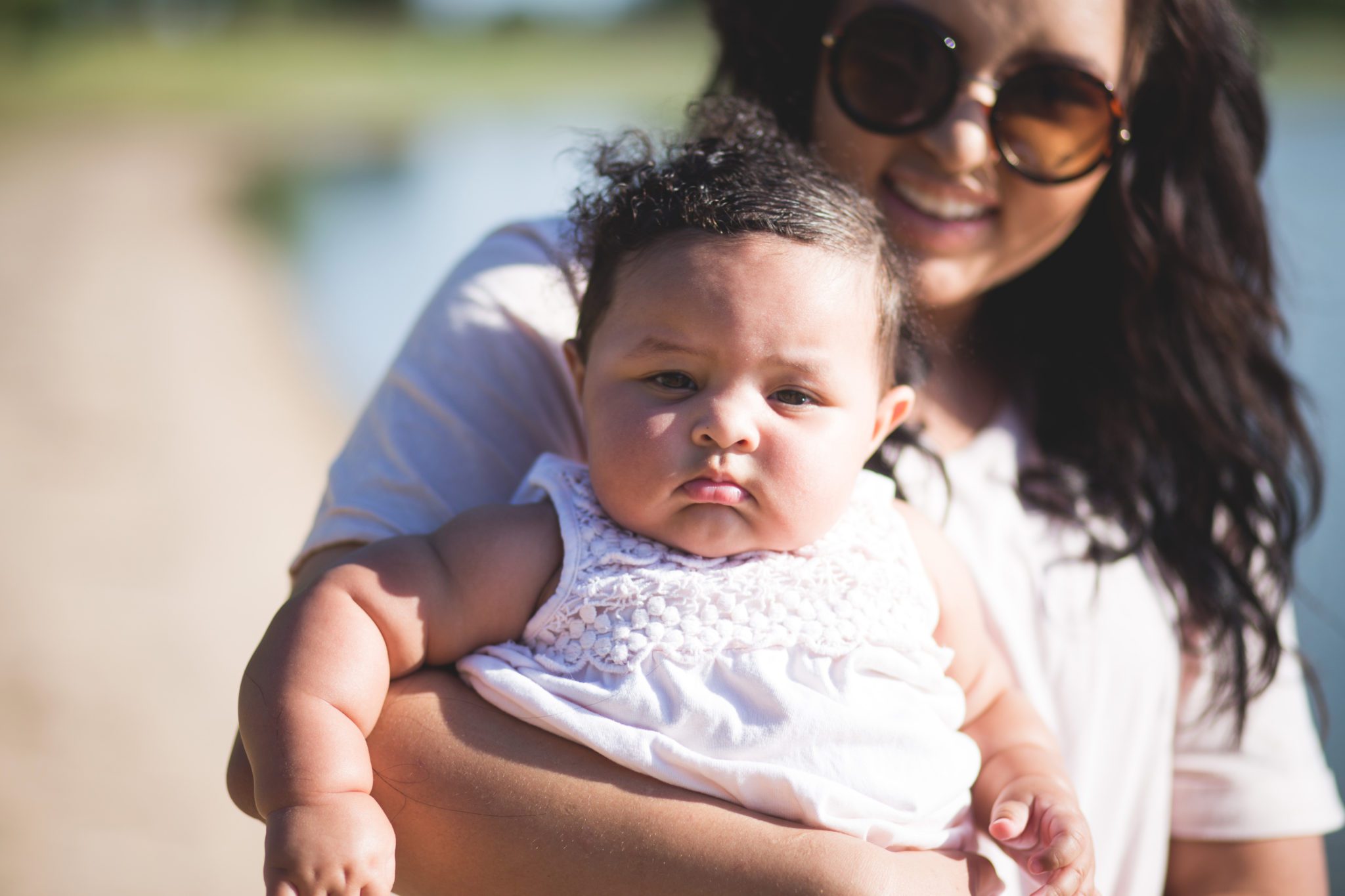 Mixed,Racial,Mother,And,Infant,Daughter,Outside,Playing,Together