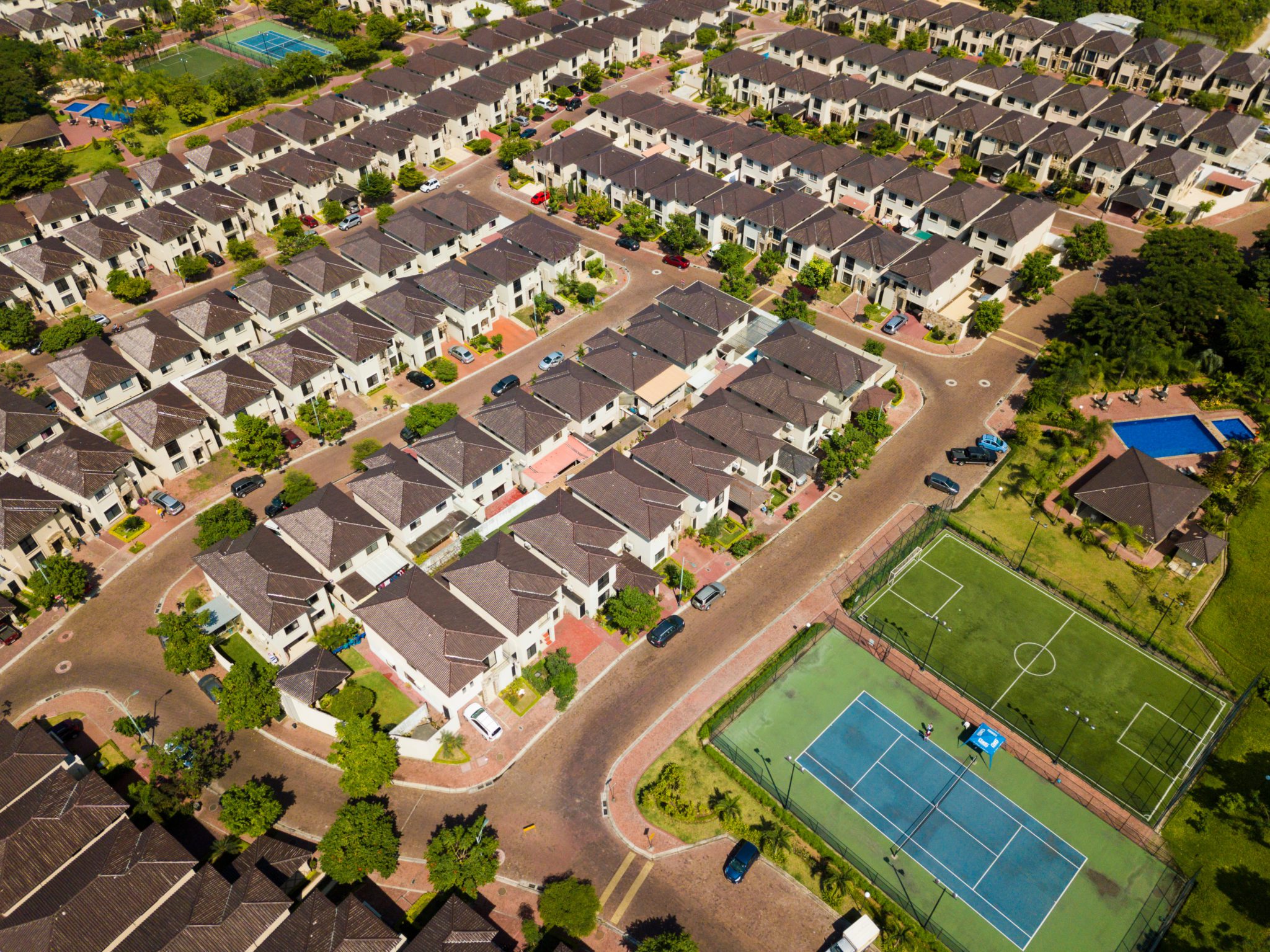 An,Aerial,View,Of,Houses,Of,A,Gated,Community,Un