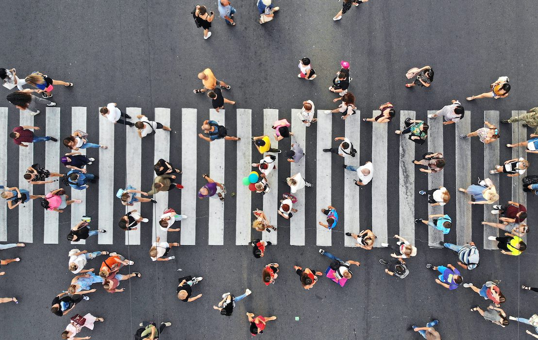 Aerial.,People,Crowd,On,Pedestrian,Crosswalk.,Top,View,From,Drone.