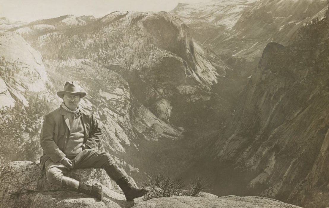 President,Theodore,Roosevelt,Sitting,On,Large,Stone,,Glacier,Point,At