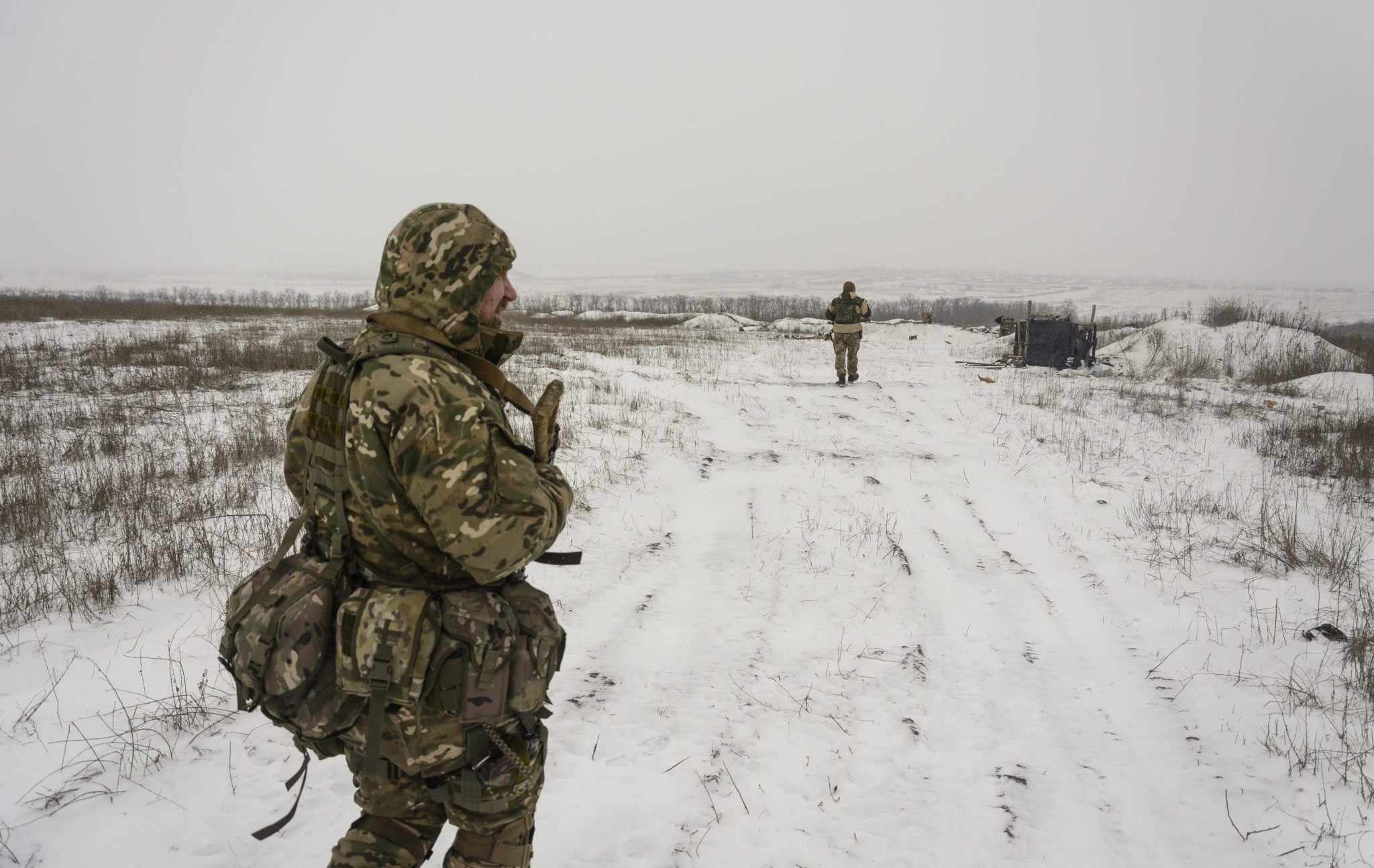 Ukrainian marines inspect abandoned Ukrainian positions near