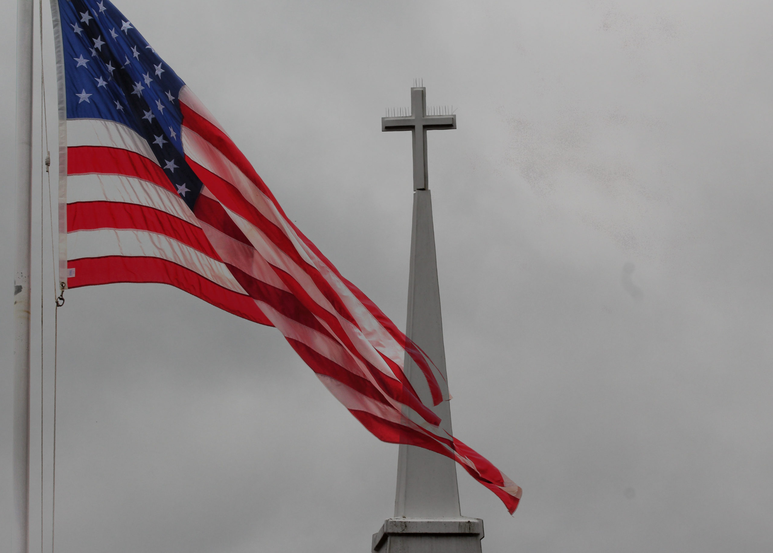 American,Flag,With,Church,Steeple,In,Background