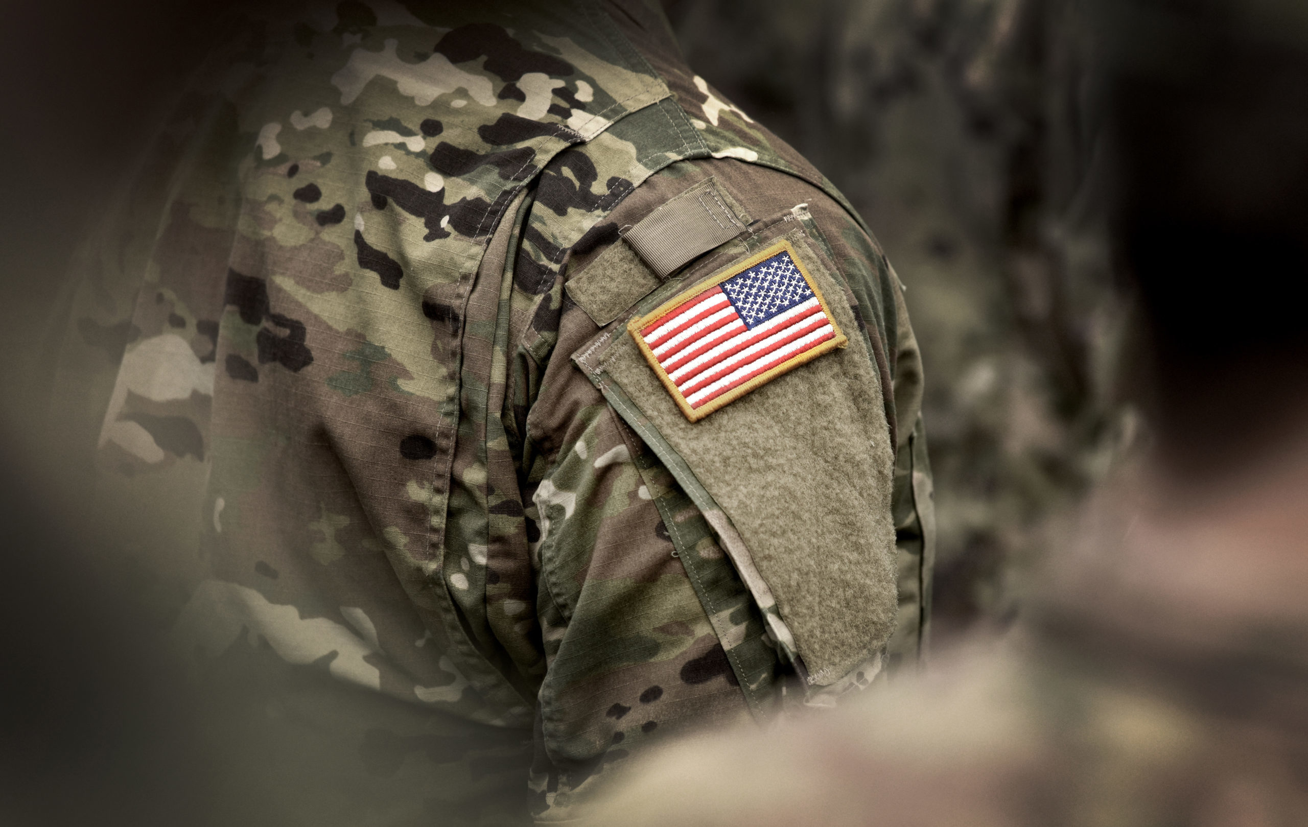 Flag,Of,Usa,On,Soldiers,Arm.,Veterans,Day.,The,United