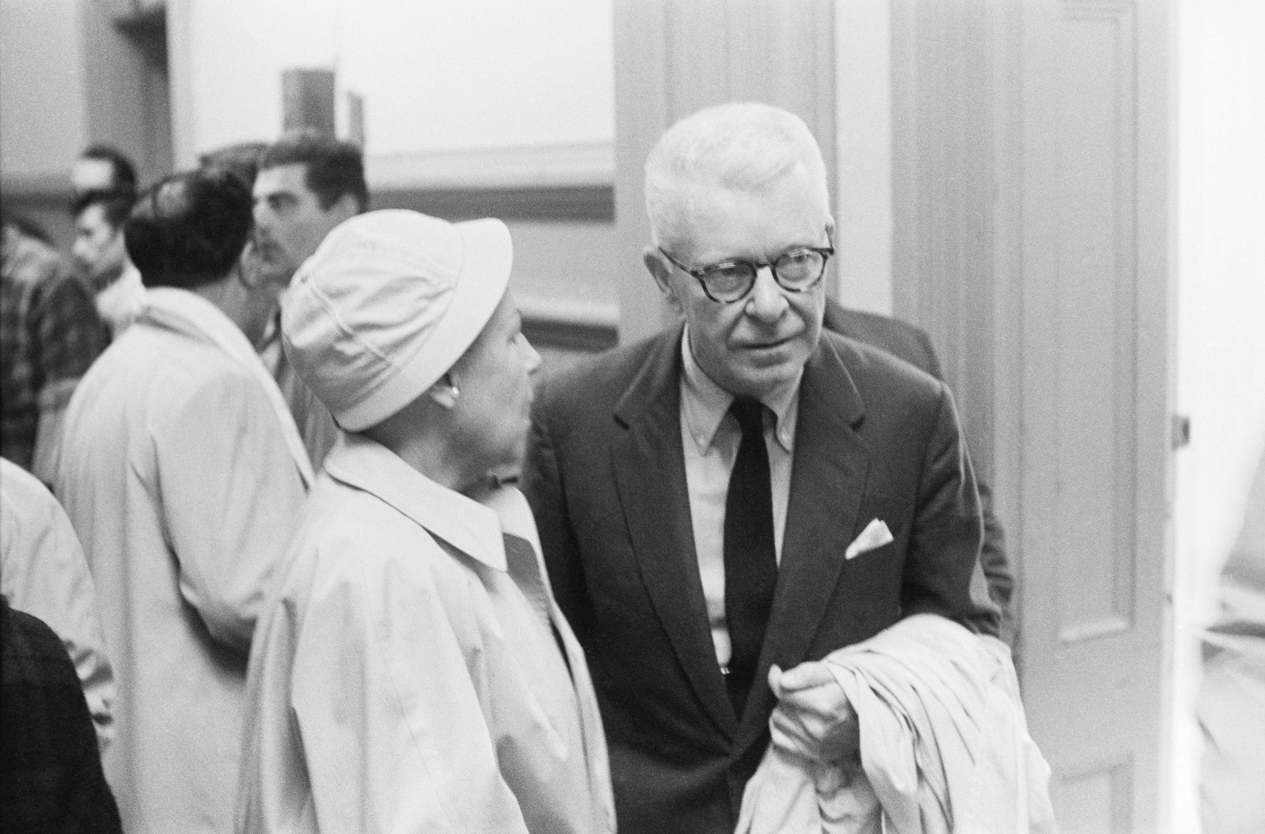 Estelle Griswold and Dr. C. Lee Buxton with Coat Going to Hearing