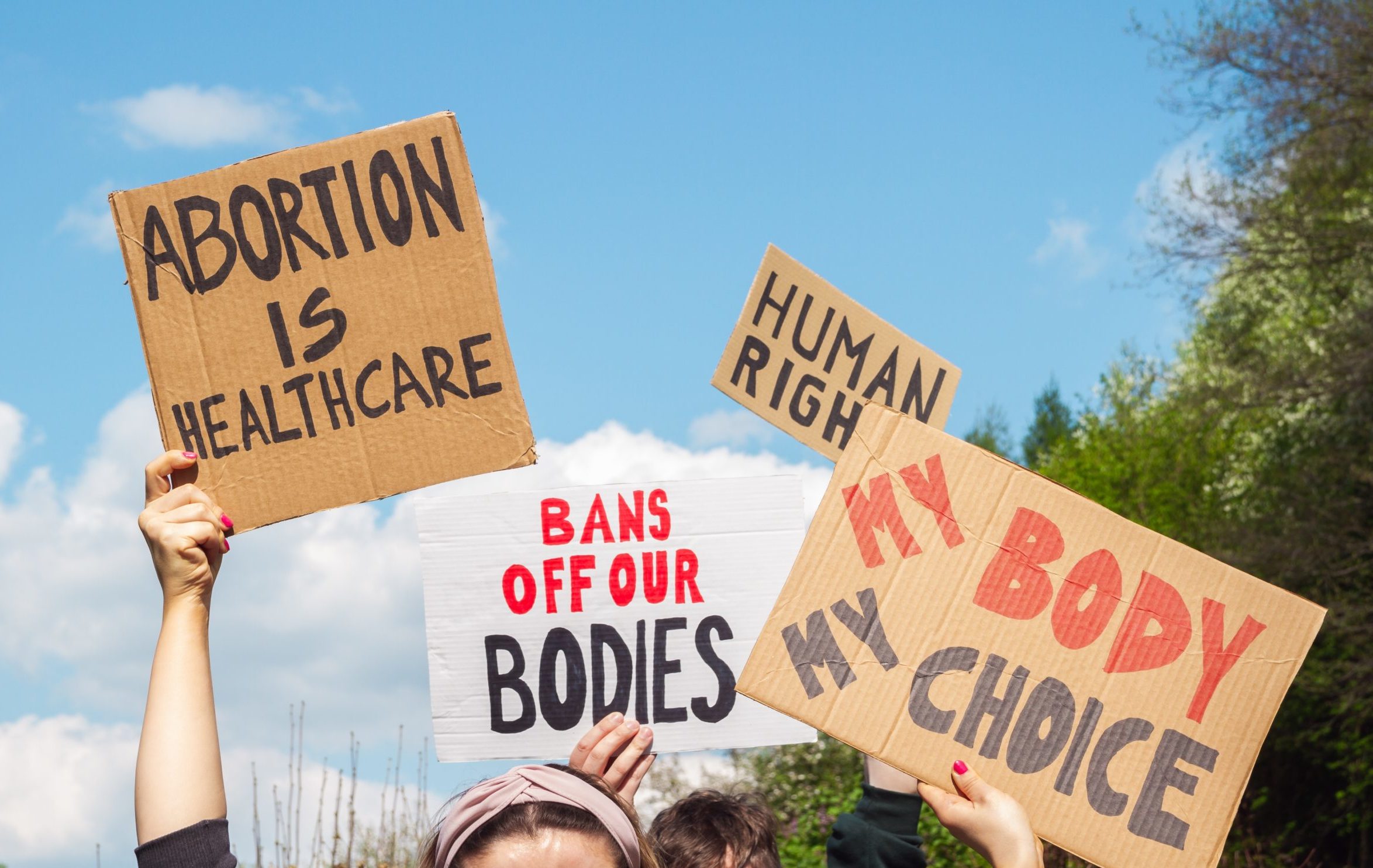 Protesters,Holding,Signs,Abortion,Is,Healthcare,,My,Body,My,Choice,