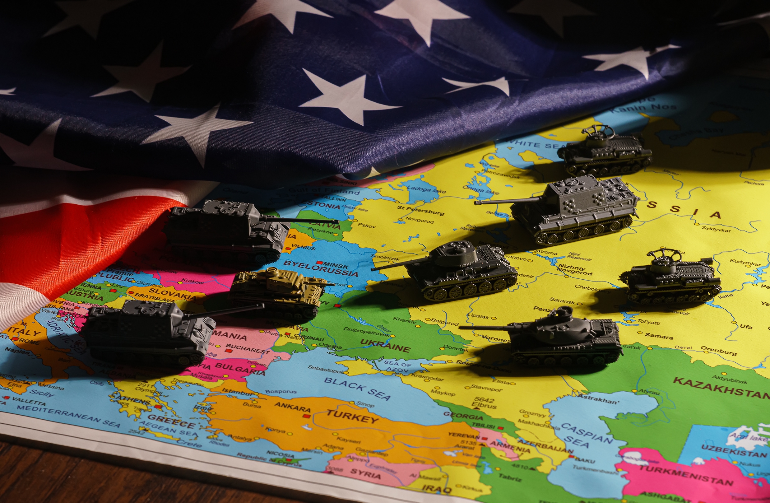 Toy,Tanks,On,The,Map.,Concept,Of,Confrontation,Between,Nato