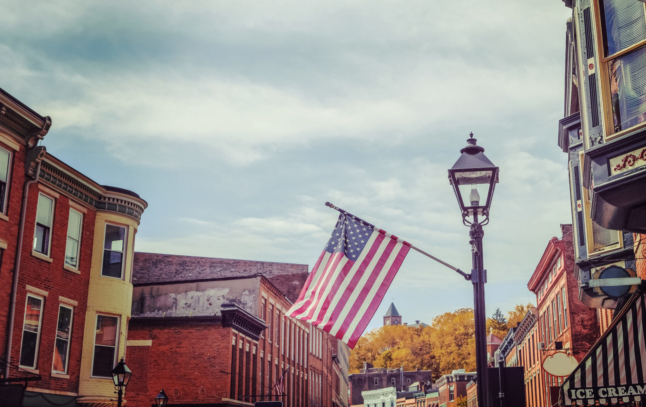 Shops,Along,Main,Street,,Galena,,Illinois,,Focus,On,Flag,,Vintage