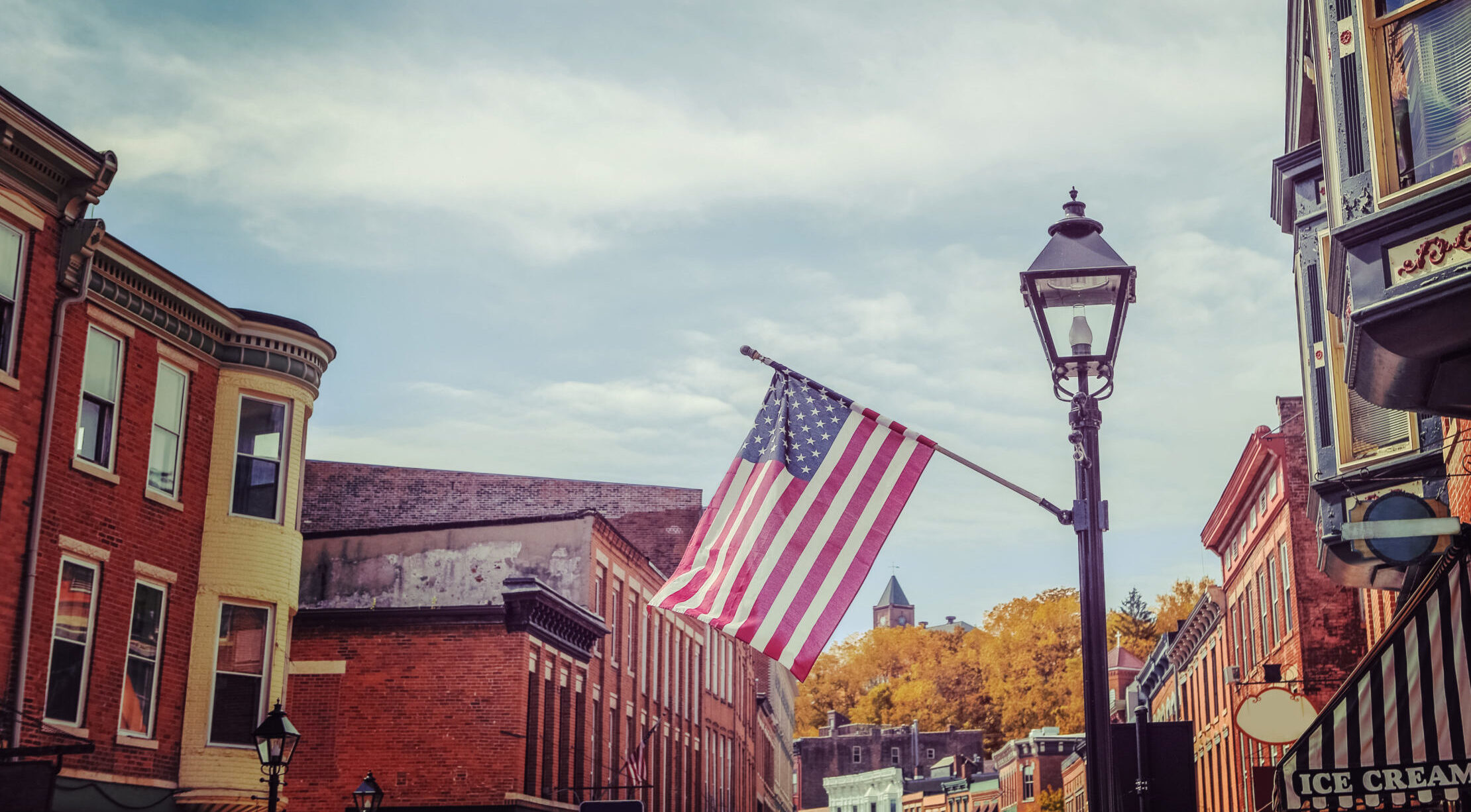 Shops,Along,Main,Street,,Galena,,Illinois,,Focus,On,Flag,,Vintage