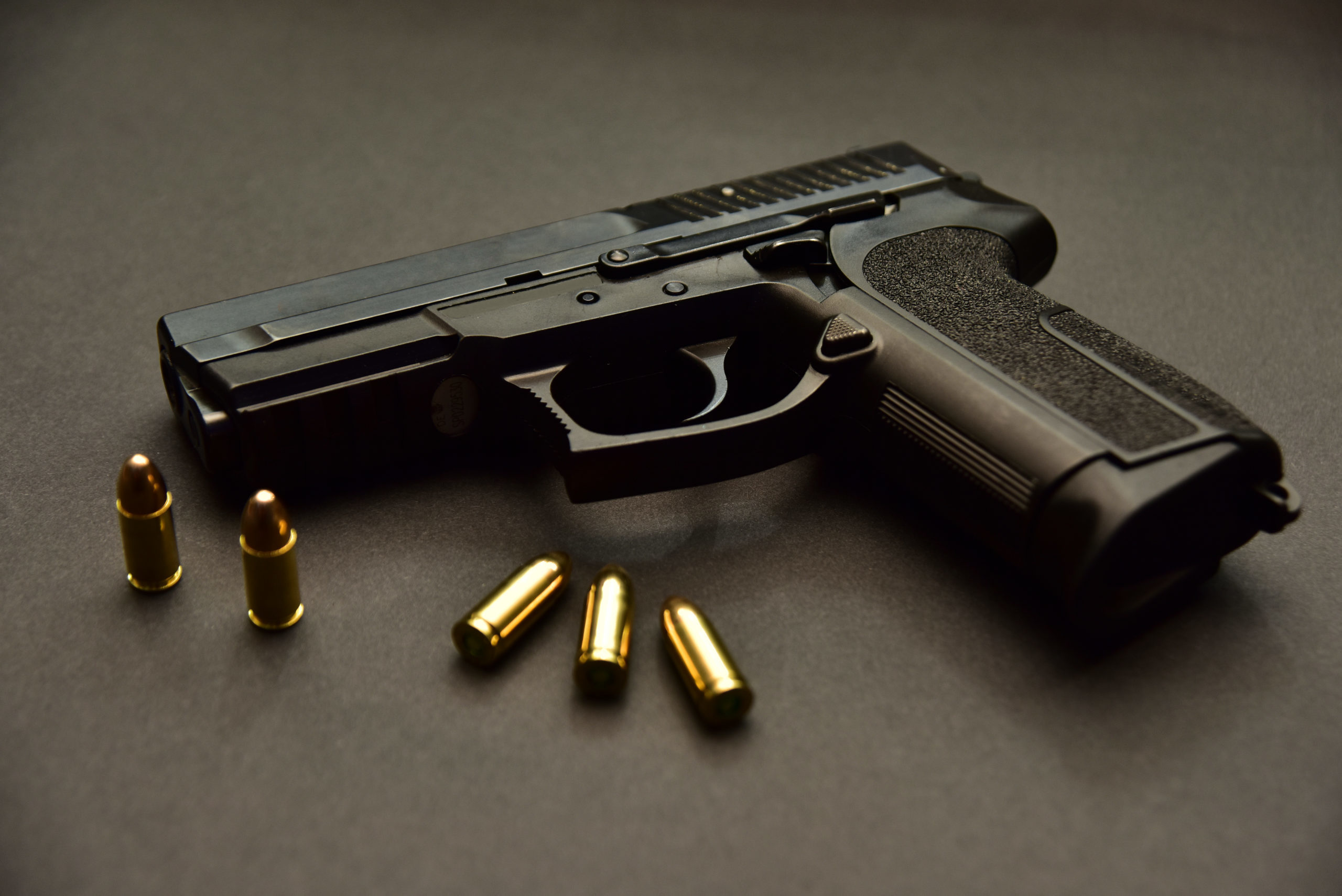 9mm,Gun,And,Bullet,On,Black,Background.,Pistol,Isolated,On