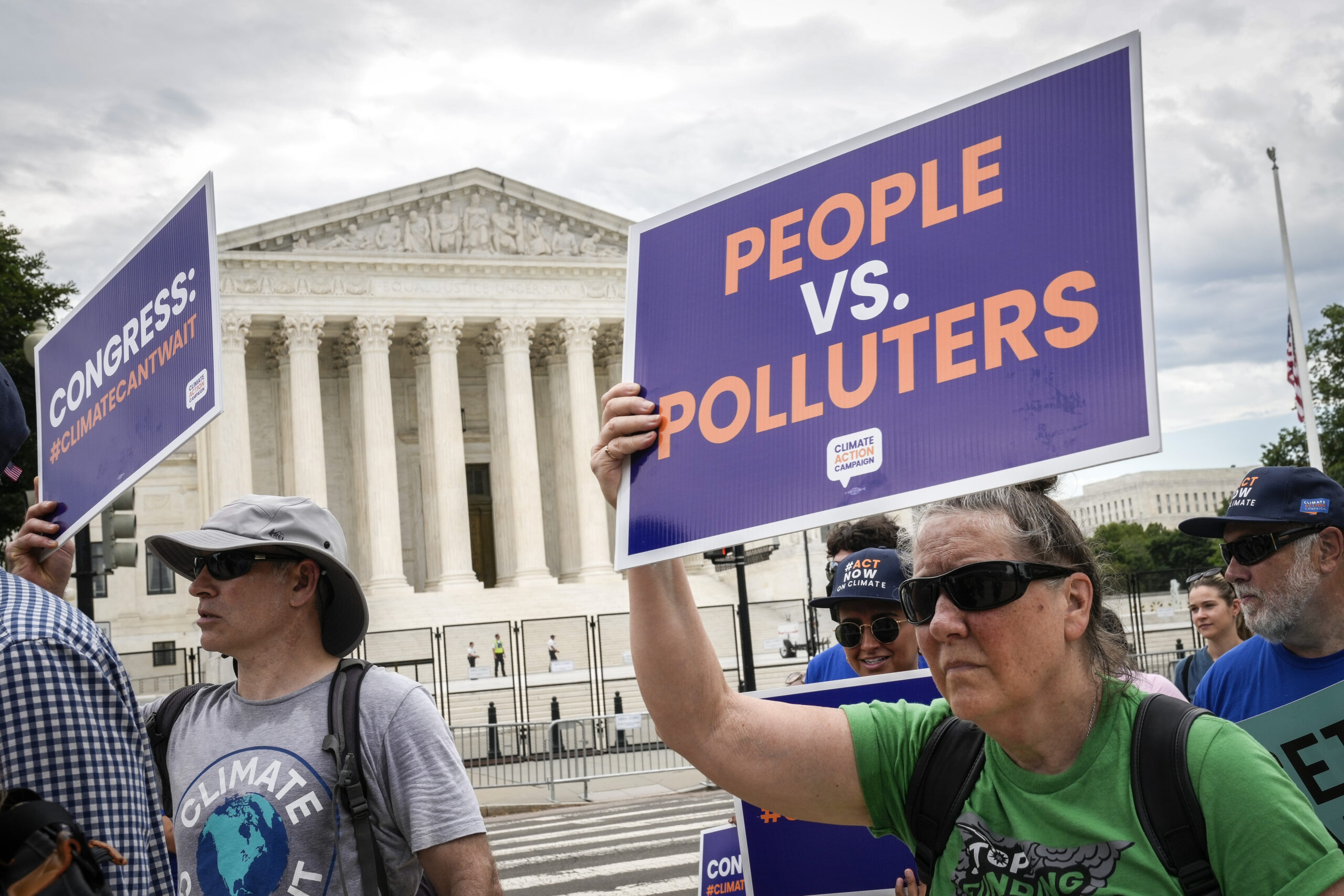 Climate Activists Rally Outside The Supreme Court Over Their Recent EPA Decision