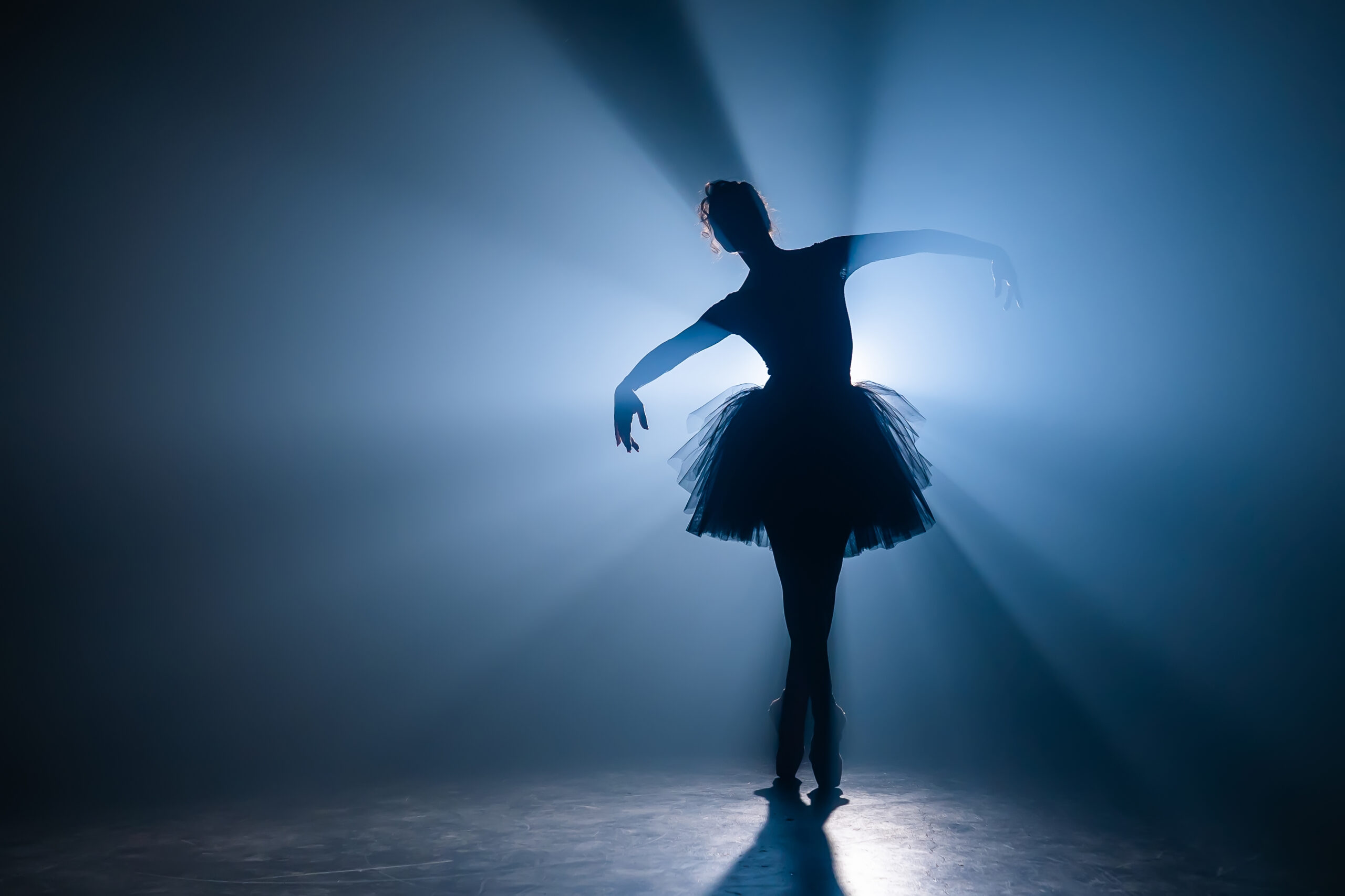 Ballerina,In,Black,Tutu,Dress,Dancing,On,Stage,With,Magic