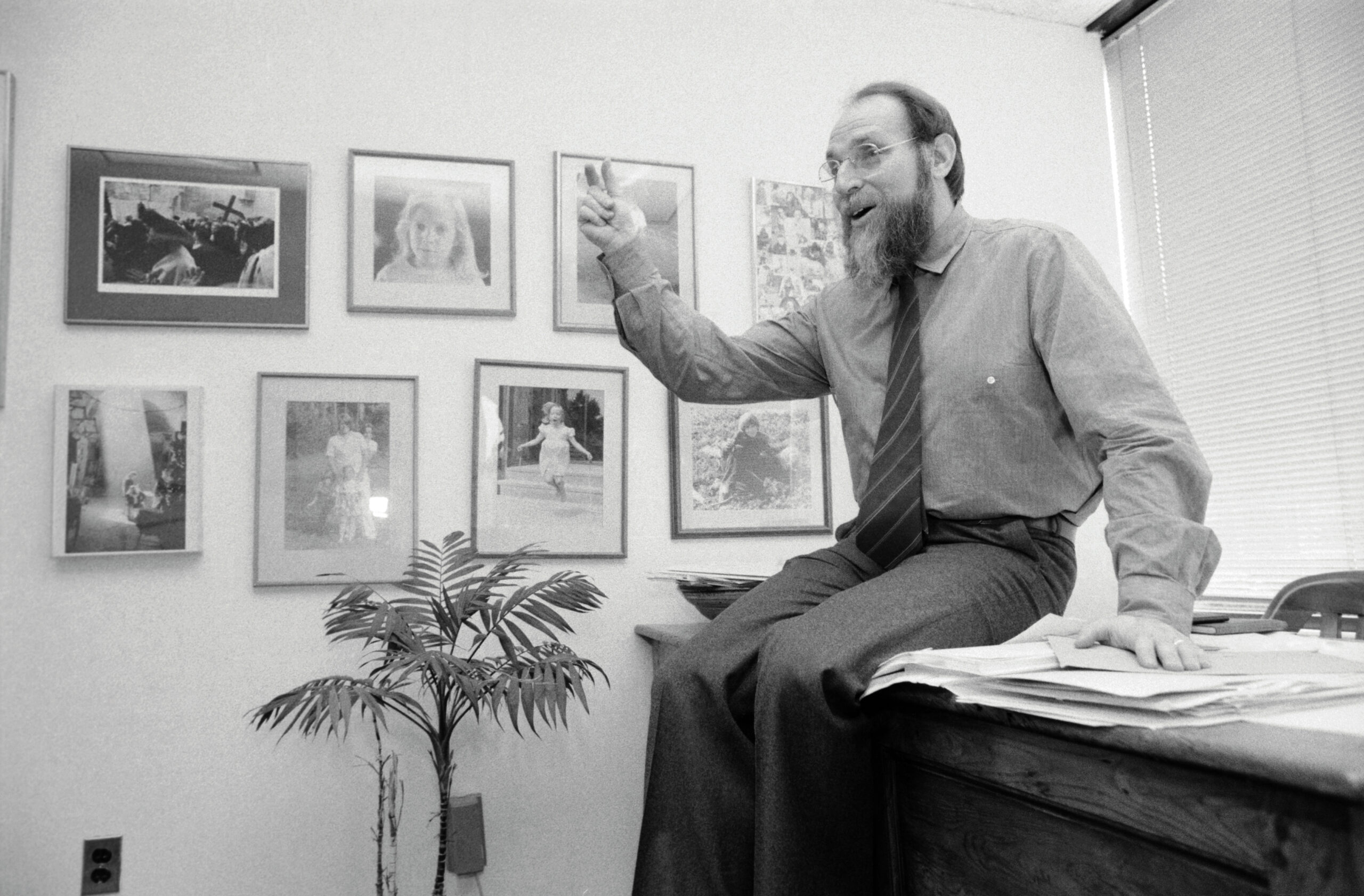 Martin Peretz Gesturing in His Magazine Office