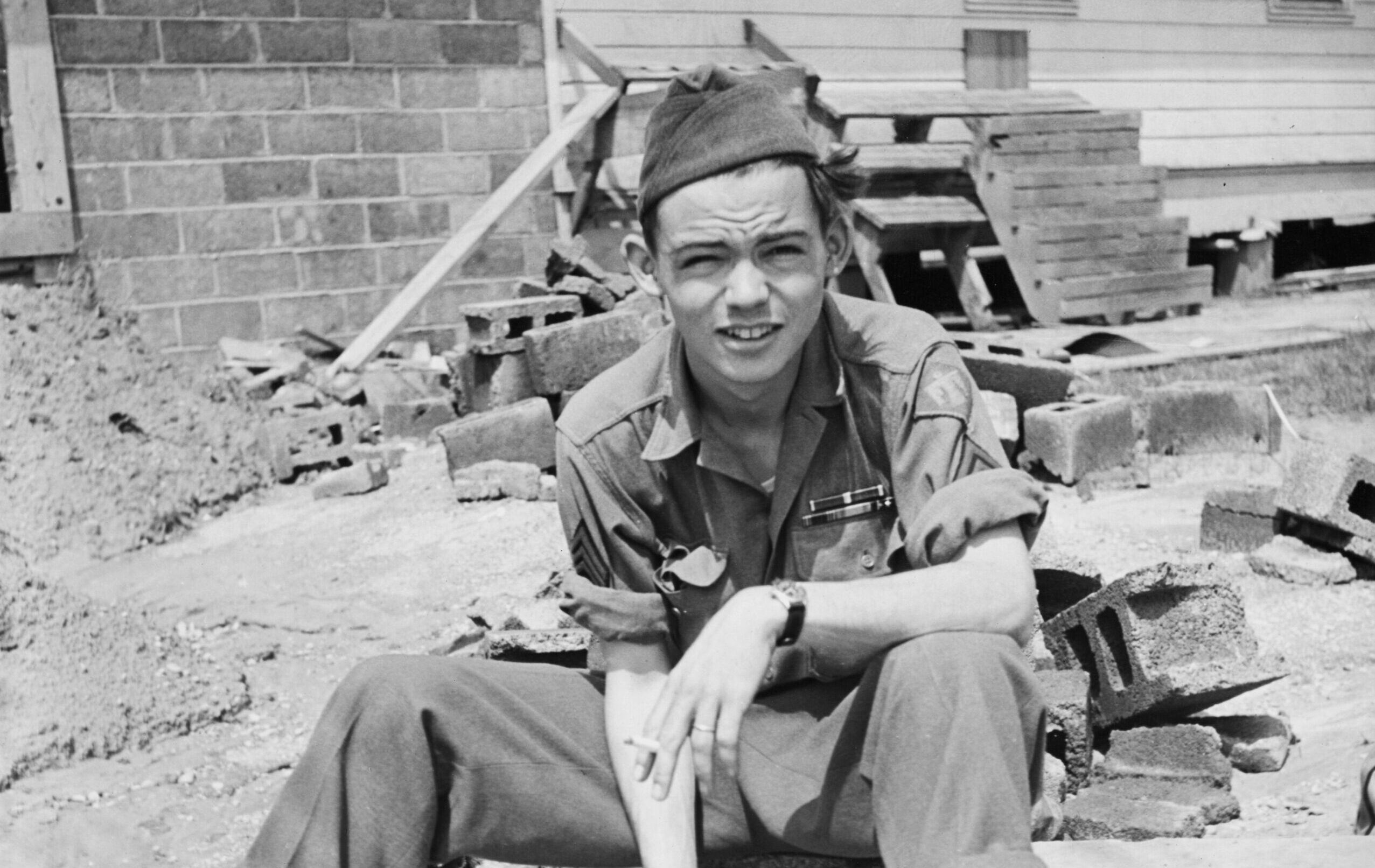 Sergeant Bill Mauldin Holding Cigarette