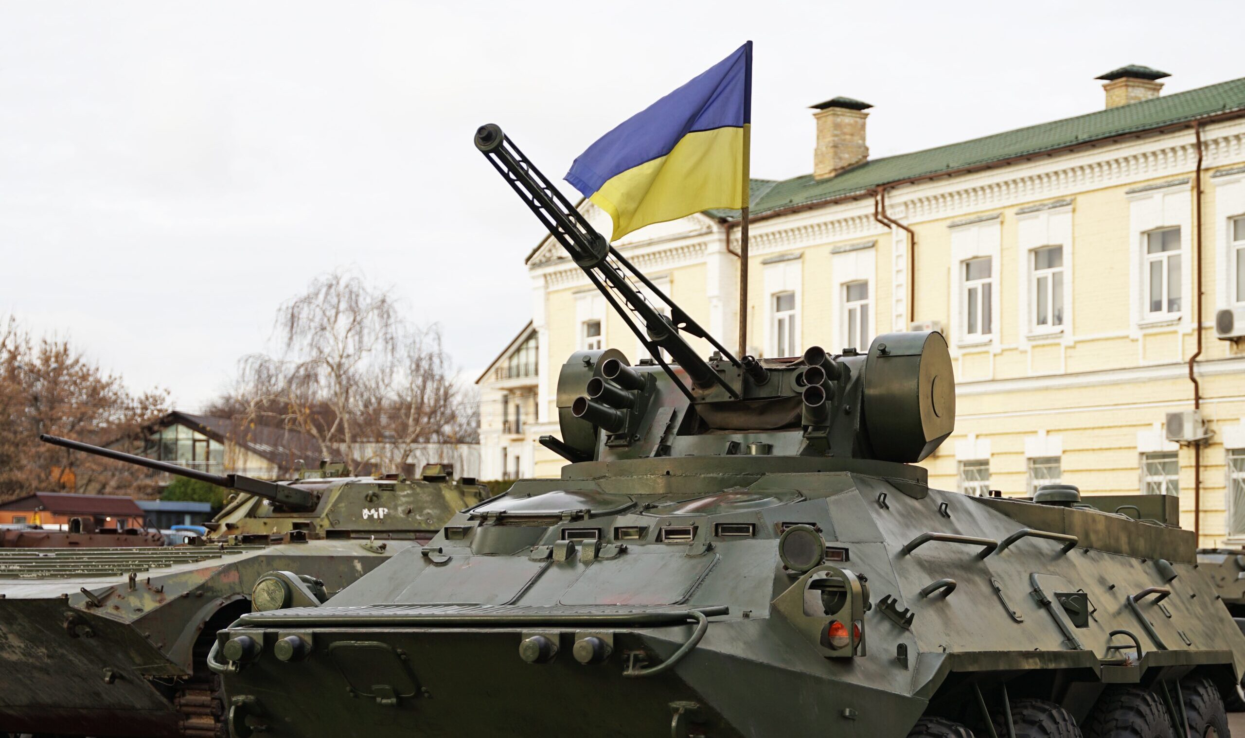 Army,Troops,Transporter,And,Tank,With,Ukrainian,Flag,,Ukraine,-