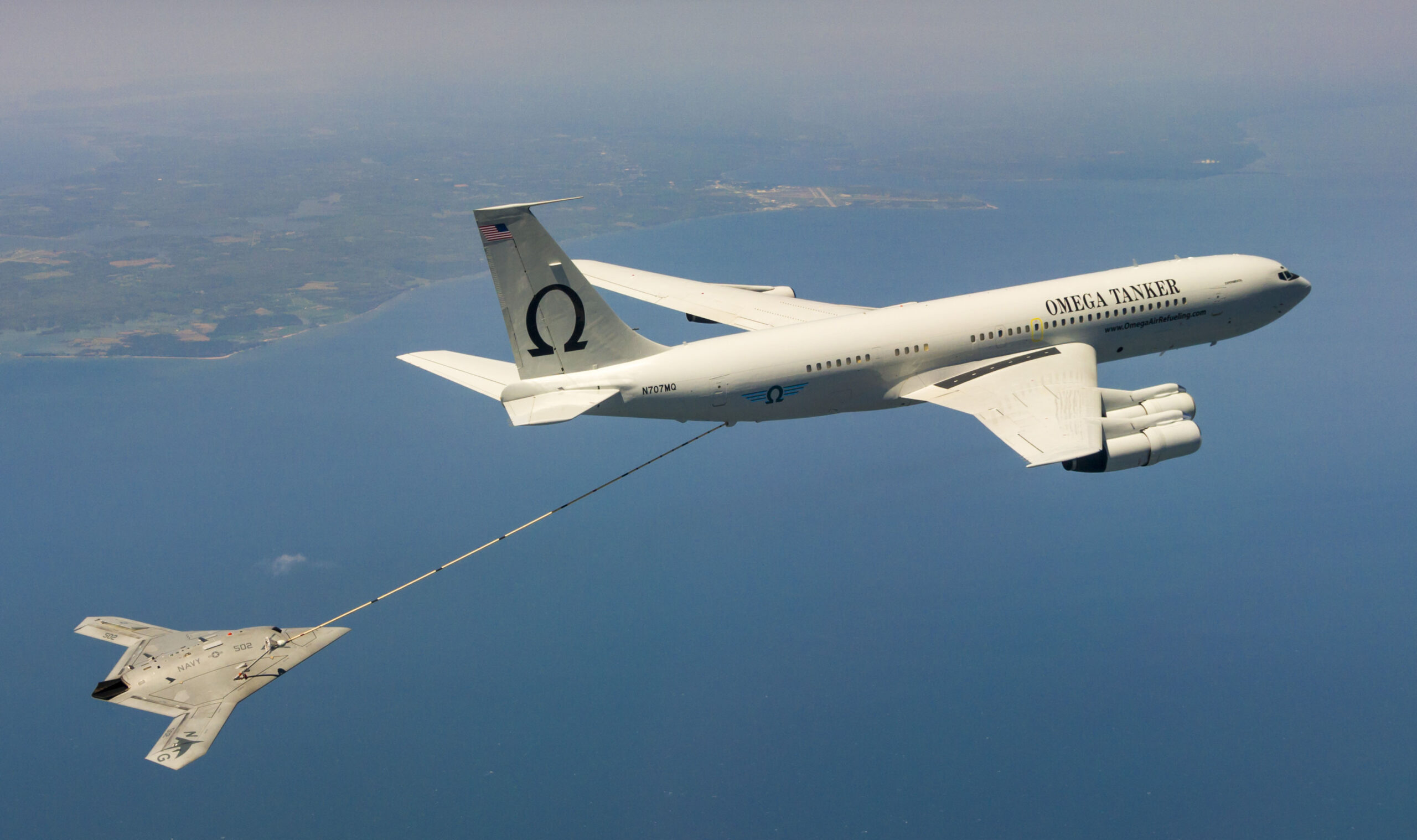 US Navy's X-47B, AV-2, Bureau # 168064, of Air Test and Evaluation Squadron Two Three (VX-23) successfully complete Air-to-Air Refueling (AAR) with the K-707 Omega Tanker over the Chesapeake Bay on 22 April 2015. VX-23 is part of the Naval Test Wing Atlantic in Naval Air Station Patuxent River, MD. The Mission Operators of the X-47B are Northrop Grumman Corporation’s Mr. Corey Lazare and Mr. Dave Fulton. Pilots of the Omega Aerial Refueling Services are Mr. Tom Straiton and Mr. Dennis Warren. (U.S. Navy Photo by Liz Wolter)