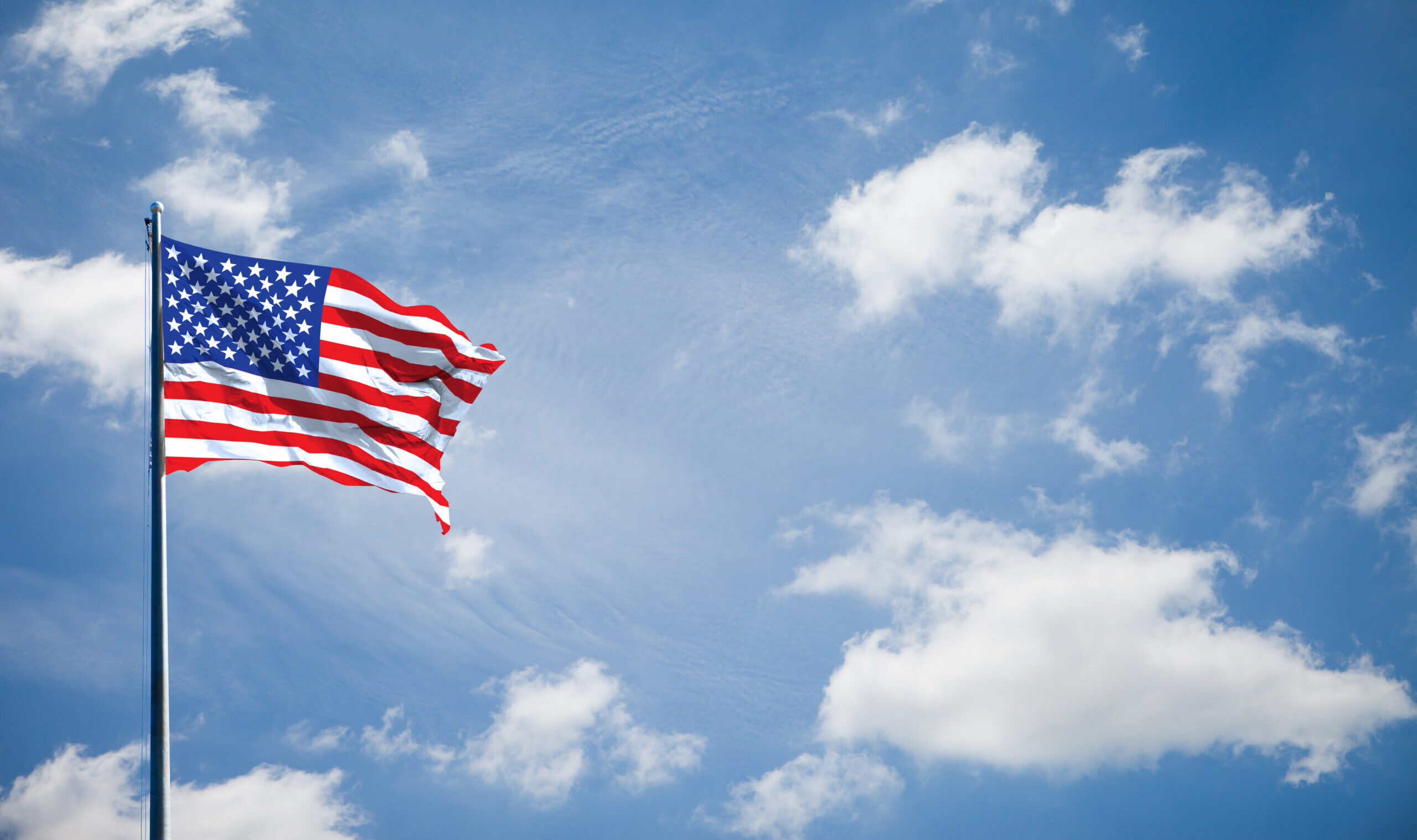 American,Flag,On,The,Blue,Sky