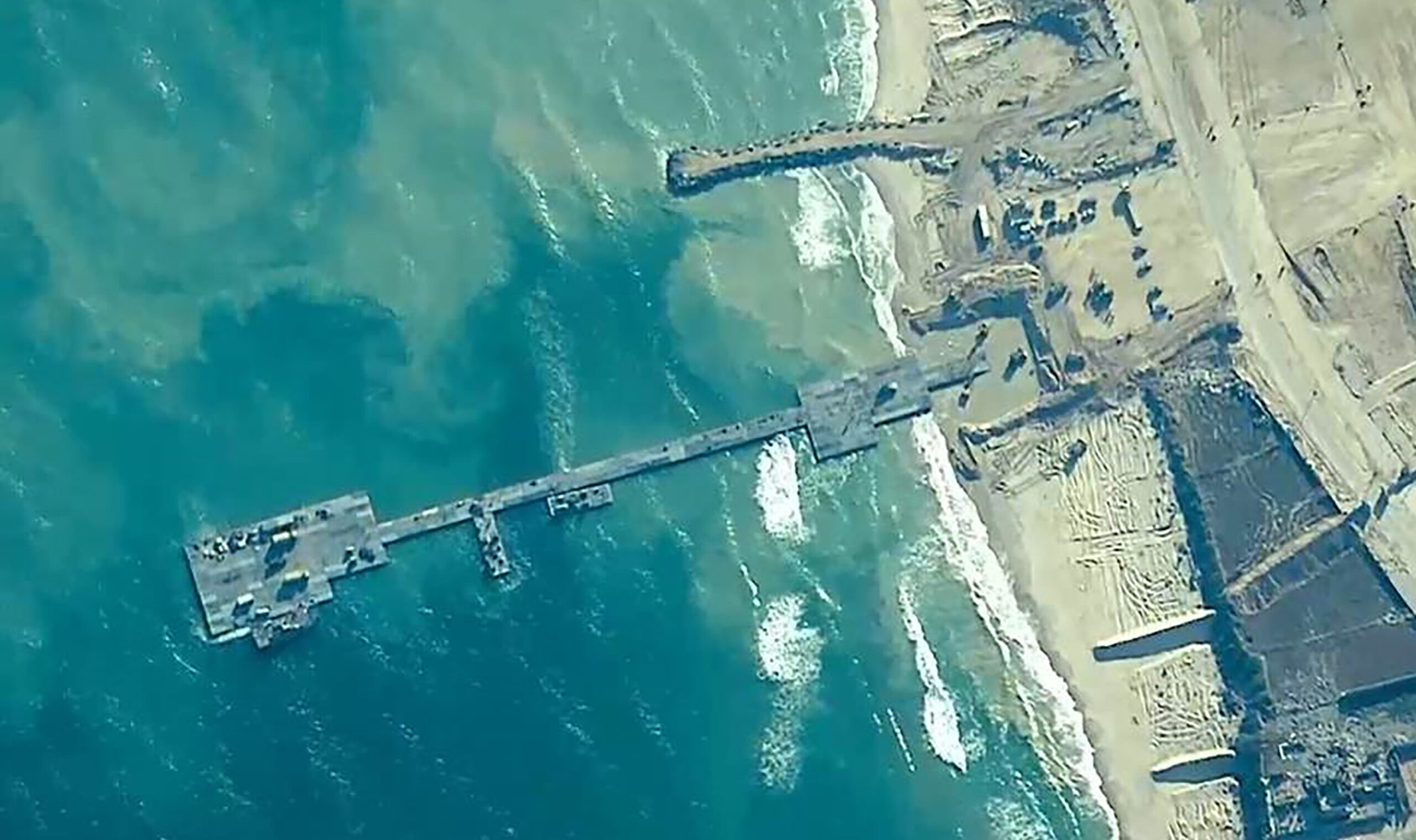 US Military Constructs Temporary Pier To Deliver Humanitarian Aid To Gaza