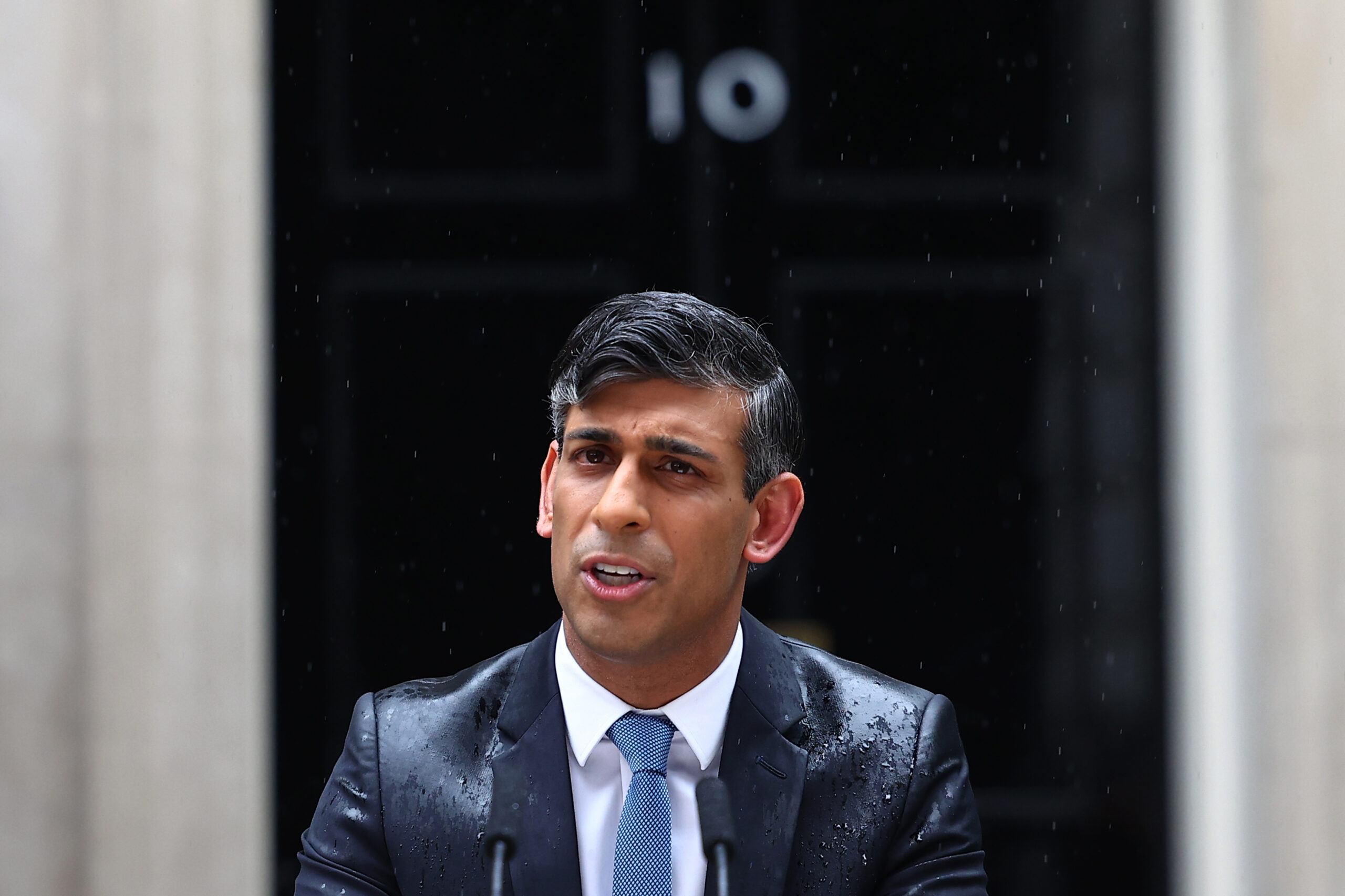 Soaked Rishi Sunak Calls British Snap Elections