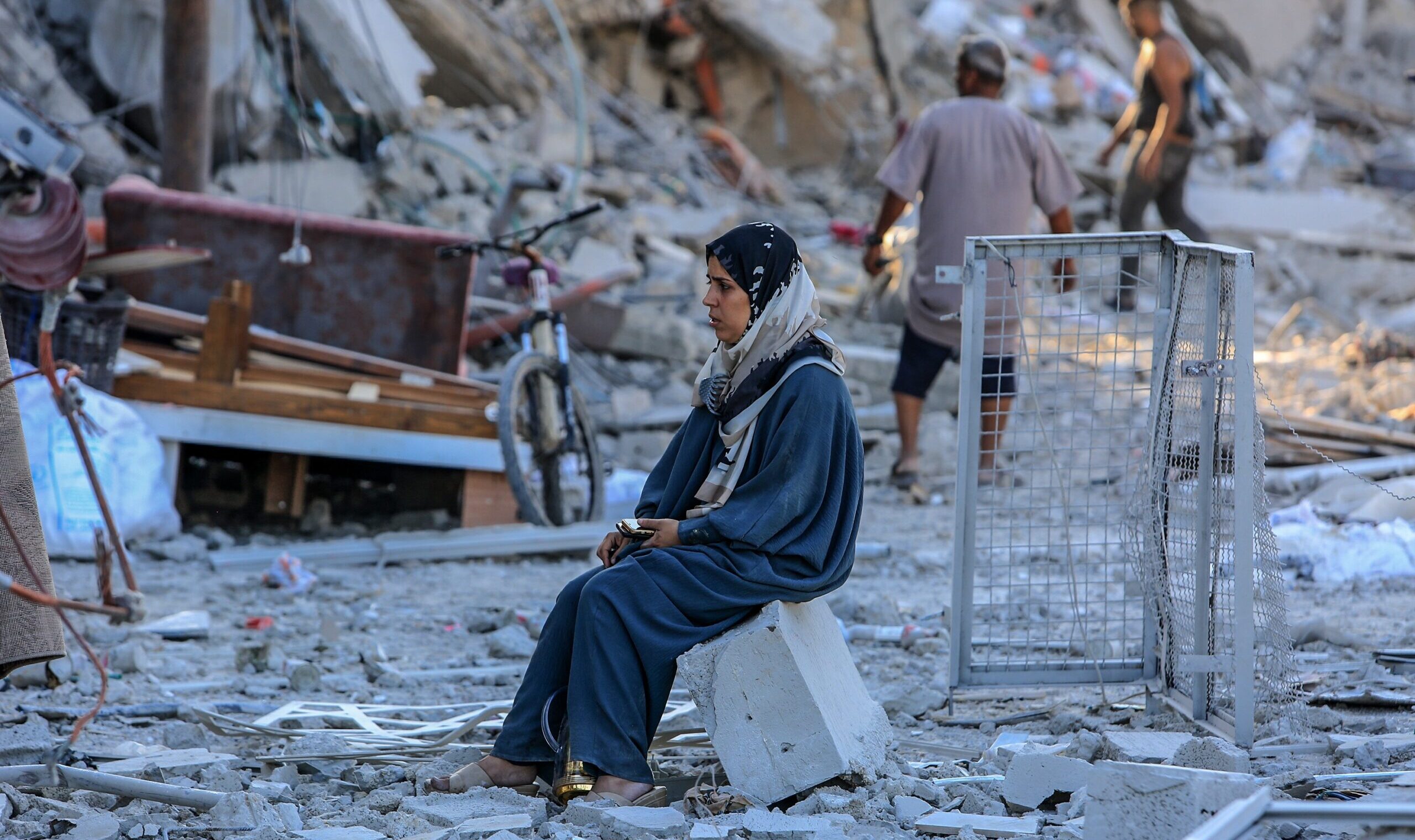 Palestinians,Return,To,Their,Destroyed,Homes,After,An,Israeli,Military