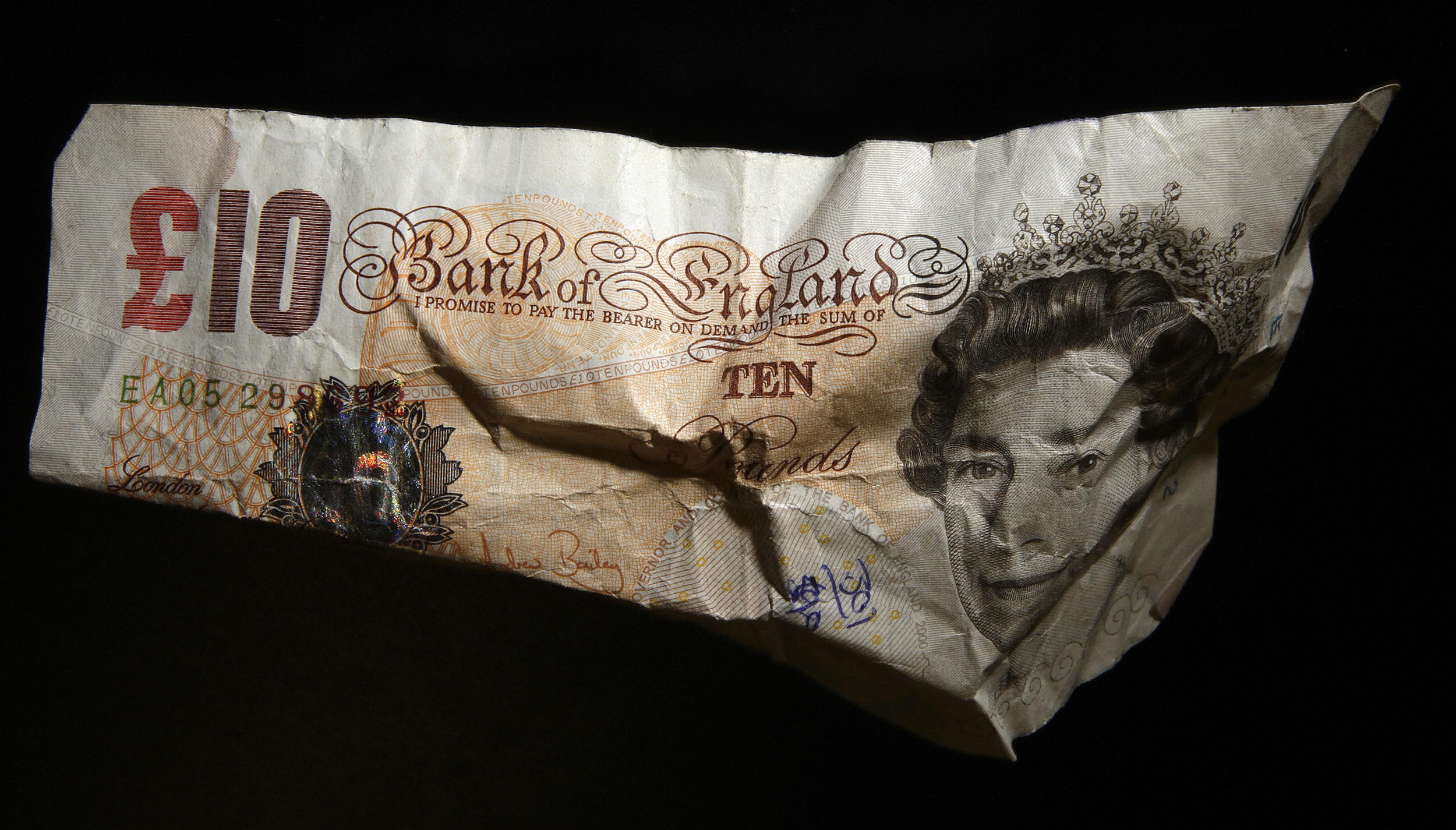 A Sterling pound note is pictured in Lon