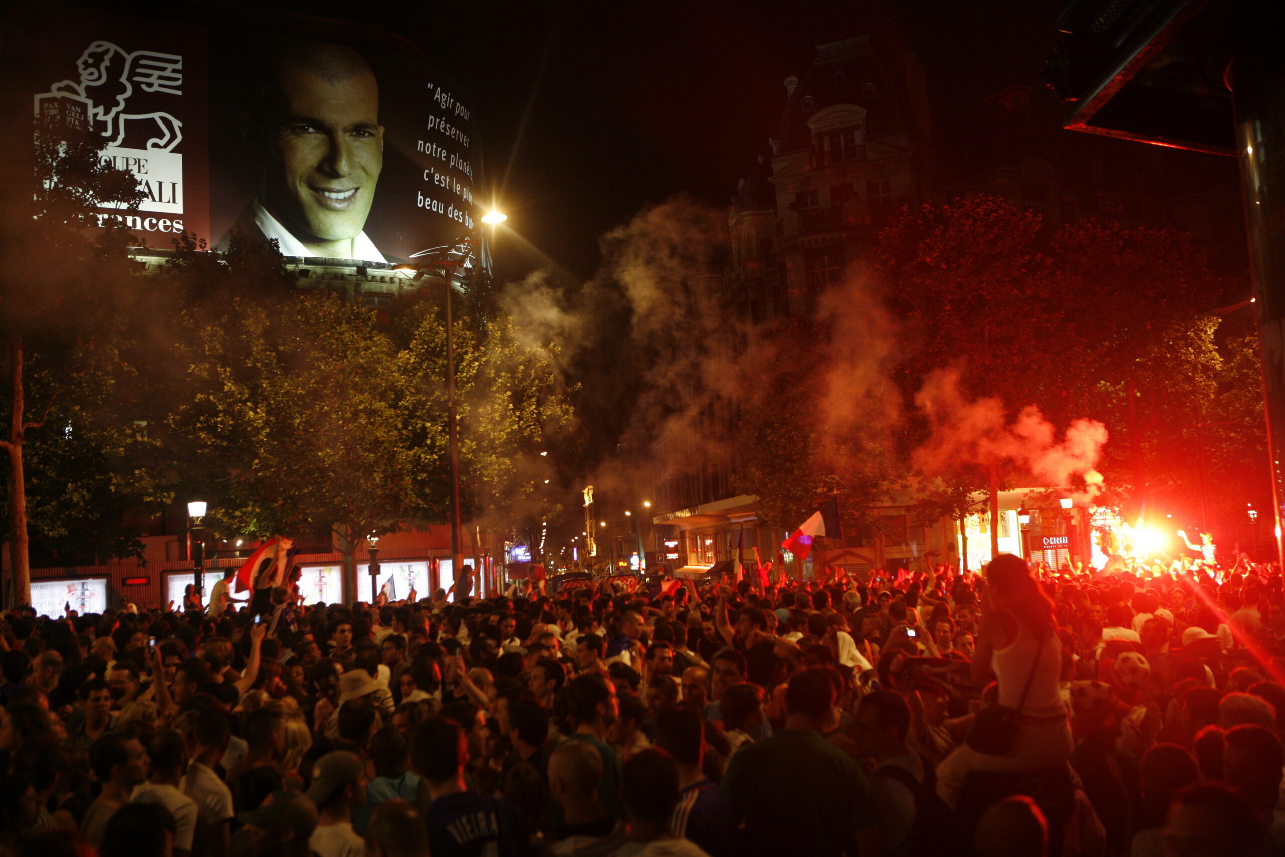 French Soccer Fans Celebrating on Champs-Elysees